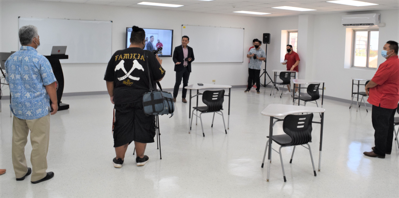 Northern Marianas College Interim President Frankie Eliptico, center foreground, speaks as he presents a new spacious classroom to Gov. Ralph DLG Torres, right, and Lt. Gov. Arnold I. Palacios, left, on Thursday at NMC.Photo by Emmanuel T. Erediano