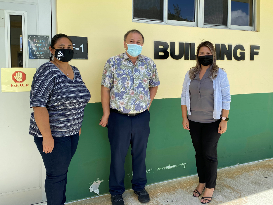 Board of Education Chairman Andrew L.  Orsini poses for a photo with Gregorio T. Camacho Elementary School principal Raena Bermudes and vice principal Melissa Mendez.
