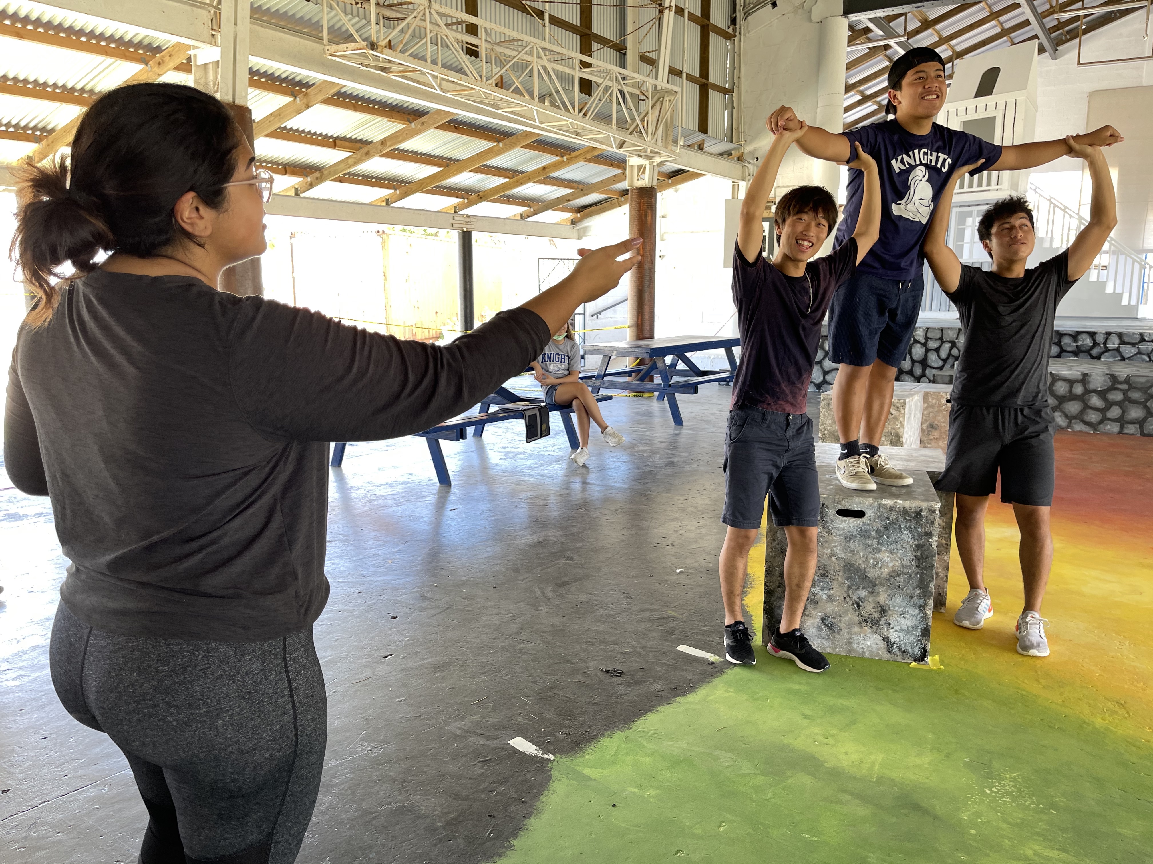 Mount Carmel School director of institutional development and Theatre Club AlumKnight, Victoria Deleon Guerrero, left, directs a scene during a recent rehearsal of William Shakespeare’s “As You Like It.”MCS photo