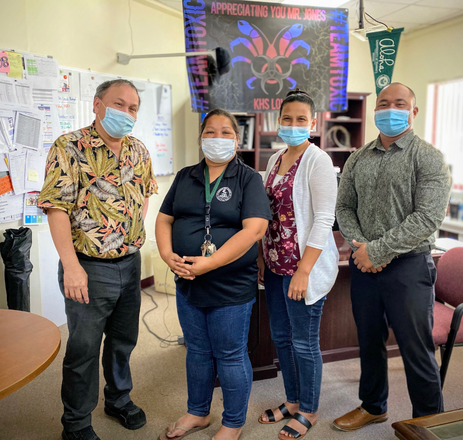 Board of Education Chairman Andrew L. Orsini  with Kagman High School principal Ben Jones, vice principal for discipline Francisca Bondoc and counselor Shirley Norita.