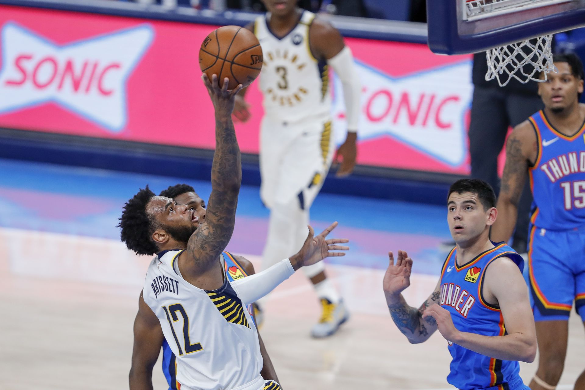 Indiana Pacers forward Oshae Brissett (12) shoots as Oklahoma City Thunder forward Gabriel Deck (6) looks on during the third quarter at Chesapeake Energy Arena in Oklahoma City on May 1, 2021.Photo by Alonzo Adams-USA TODAY Sports