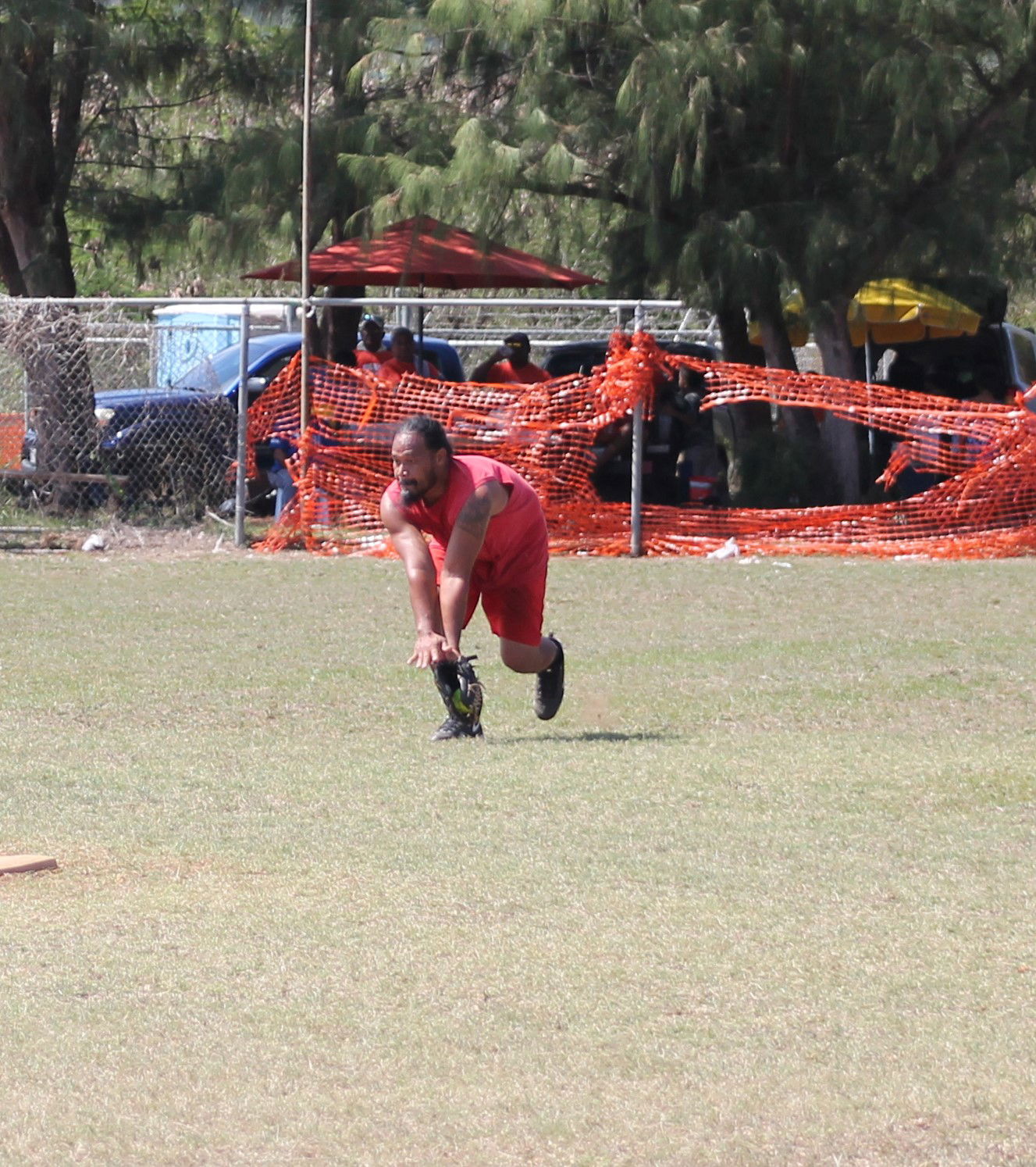 Mommy Charu's left outfielder Kuich secures the line drive during a Belau Amateur Softball League game Sunday at the Dandan baseball field.Photo by James F. Sablan Jr.