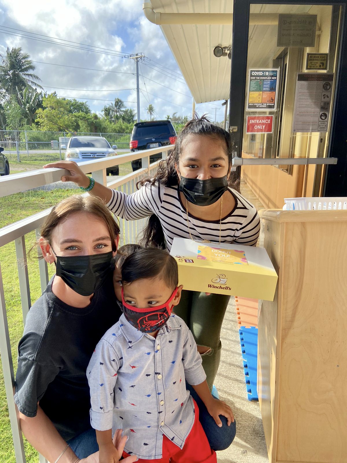 Kyrie Aldan Tenorio with his Early Head Start teachers Daiva Pliscou and Francine Sos who received a gift from their student.