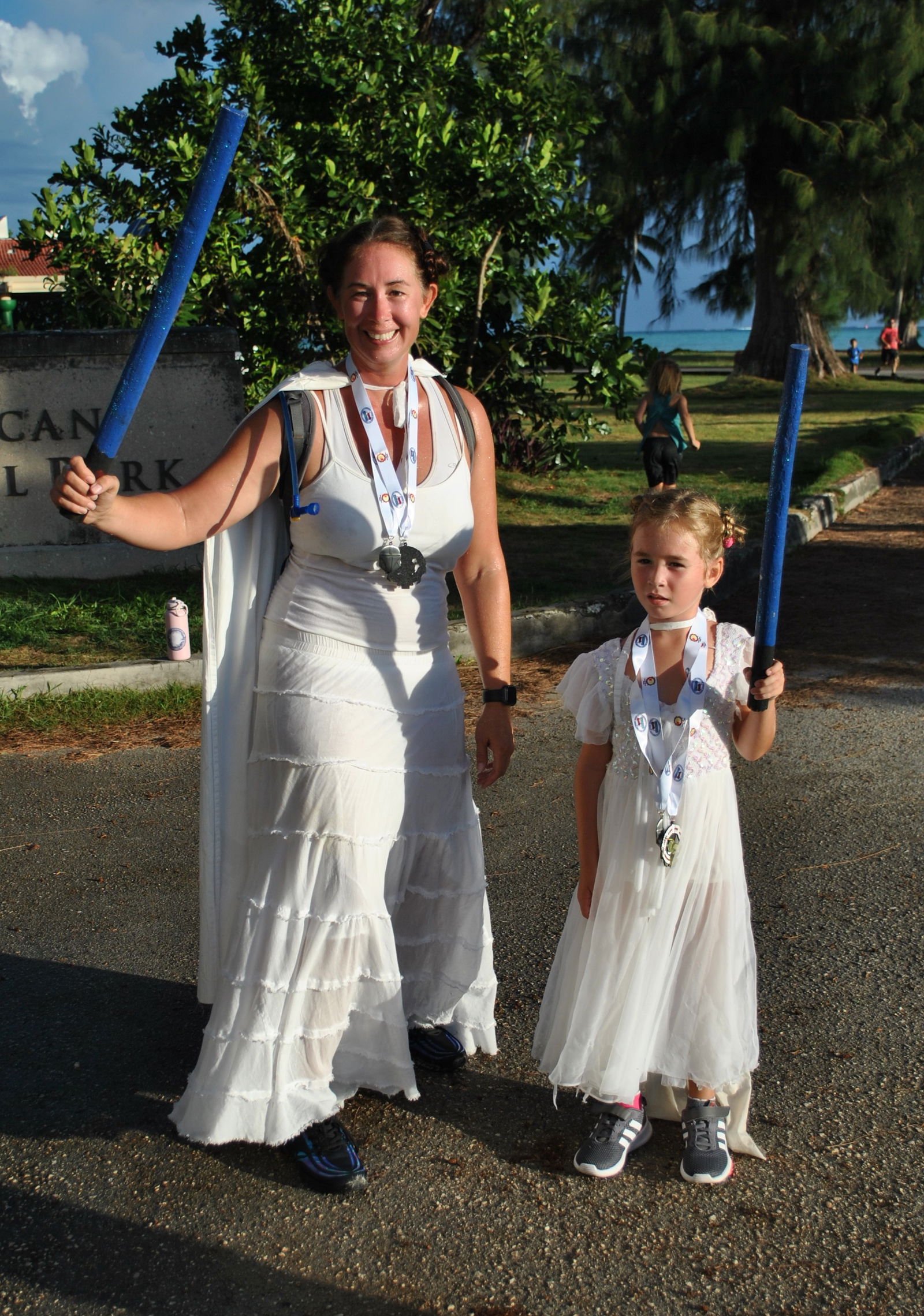 Doemiko and Miriam Flores pose after completing the one-mile May The 4th Be With You, CNMI run at  American Memorial Park on Sunday.Photo by James F. Sablan Jr.