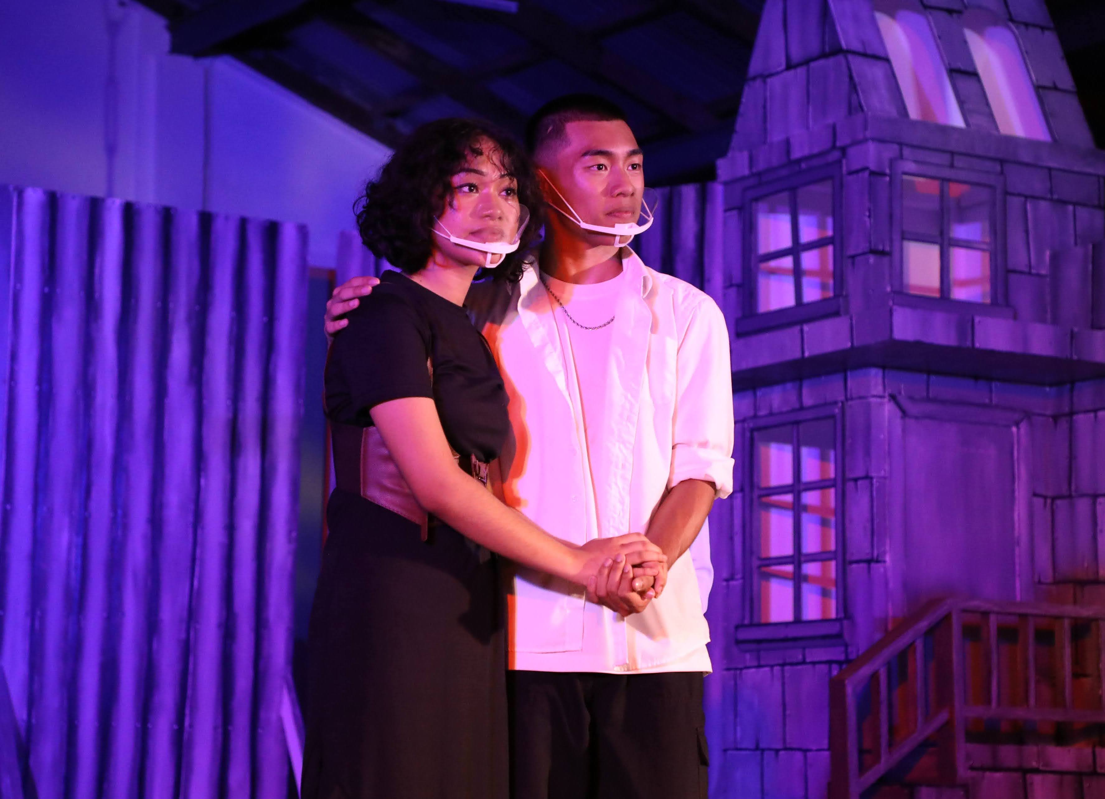 After many challenges, Rosalind, portrayed by Kina Dela Cruz, left, and Orlando, portrayed by Larry Cruz, right, are reunited in the final scene.