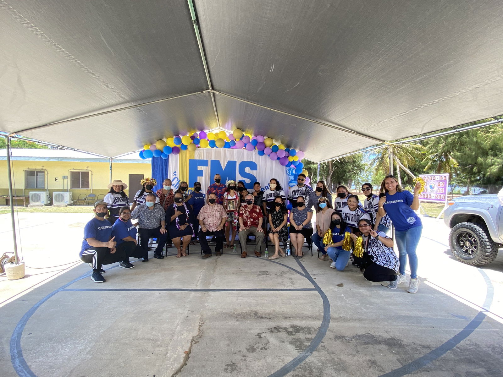 Francisco M. Sablan Middle School class salutatorian and Commissioner of Education awardee  Leia Joleen Hocog Pangelinan with her family and education officials led by Education Commissioner Alfred B. Ada, Board of Education Chairman Orsini, principal Cherlyn Cabrera-Osung and vice principal Carla Sablan.