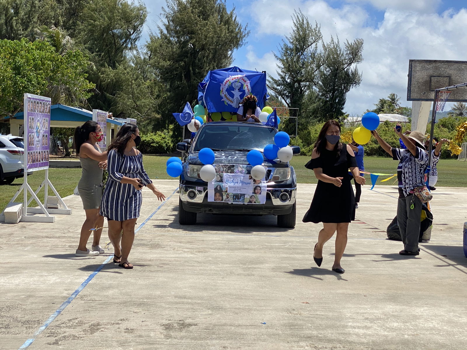 Family members of one of the promoted students perform a dance number.