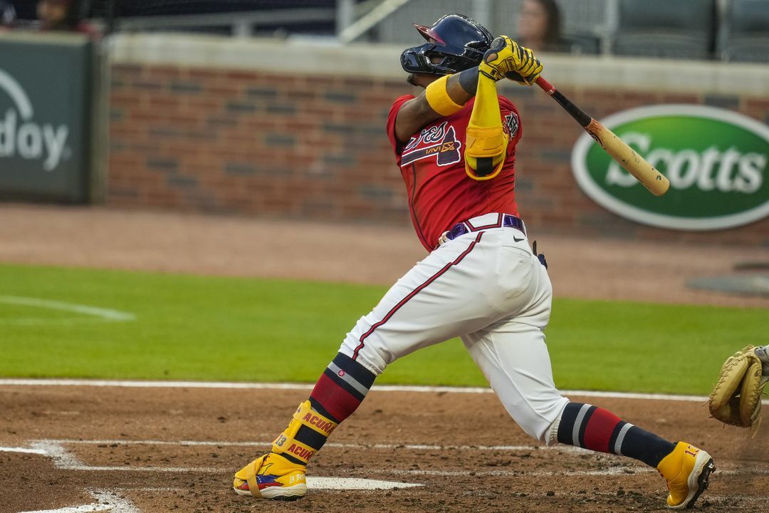 Atlanta Braves right fielder Ronald Acuna Jr. (13) hits a grand slam home run against the Pittsburgh Pirates during the second inning at Truist Park in Cumberland, Georgia on May 21, 2021.Photo by Dale Zanine-USA TODAY Sports