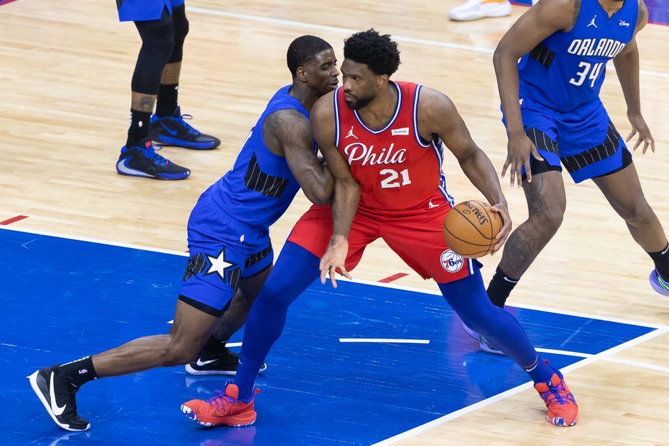 Philadelphia 76ers center Joel Embiid (21) drives against Orlando Magic guard Dwayne Bacon (8) during the third quarter at Wells Fargo Center in Philadelphia, Pennsylvania on Friday.Photo by Bill Streicher-USA TODAY Sports
