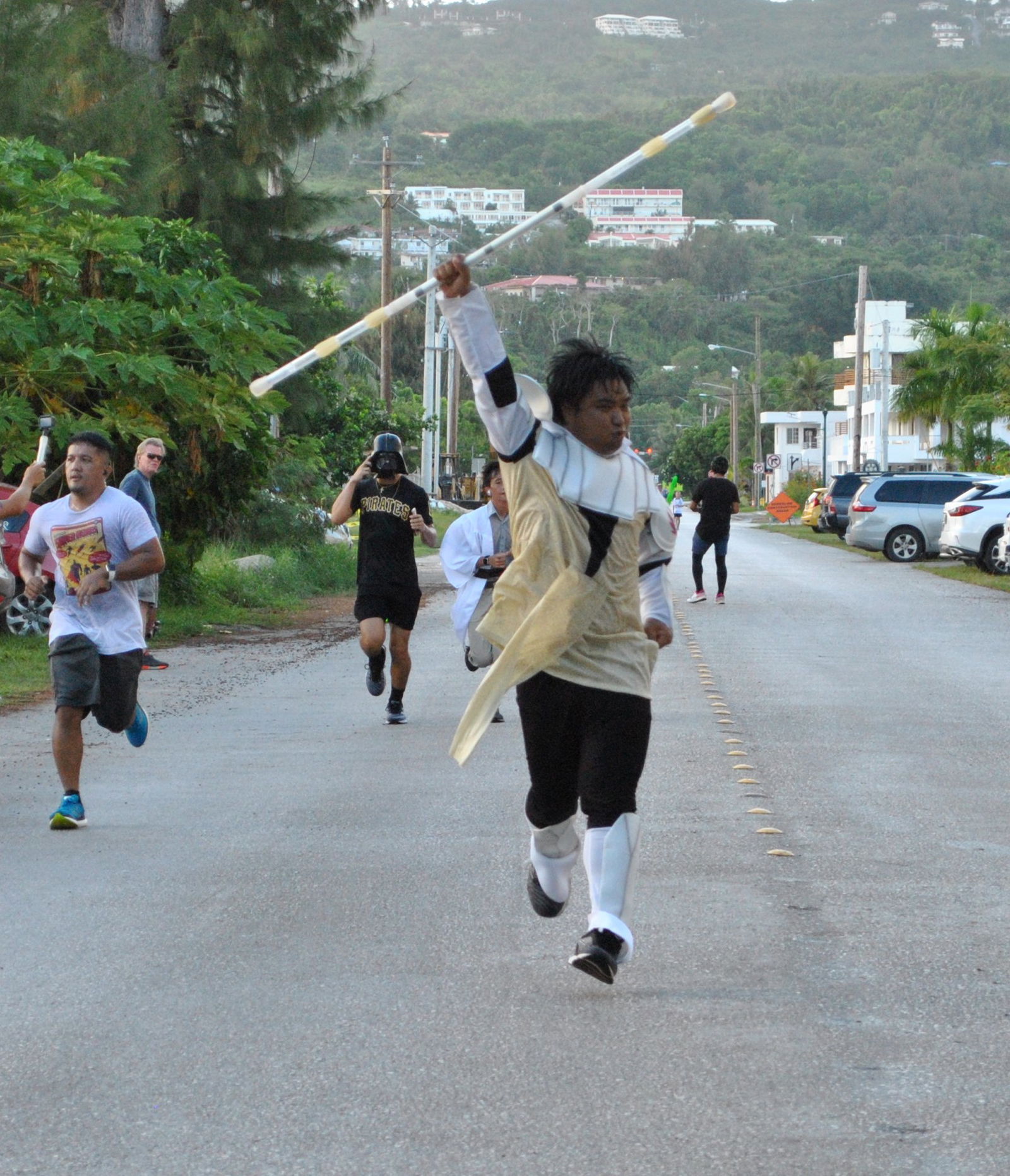 Simon Necesito celebrates as he completes the course.