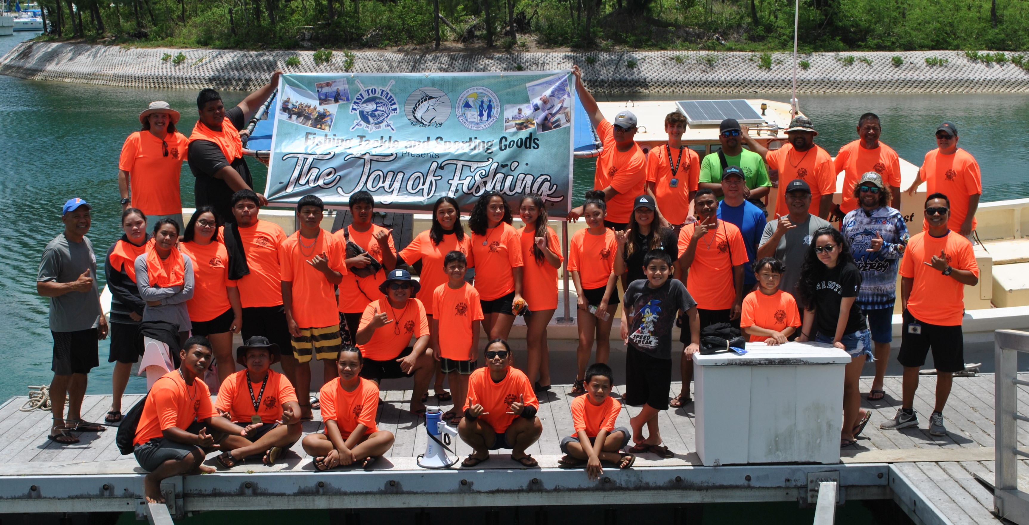 The Tasi to Table students and members pose for a group photo.Photo by James F. Sablan Jr.