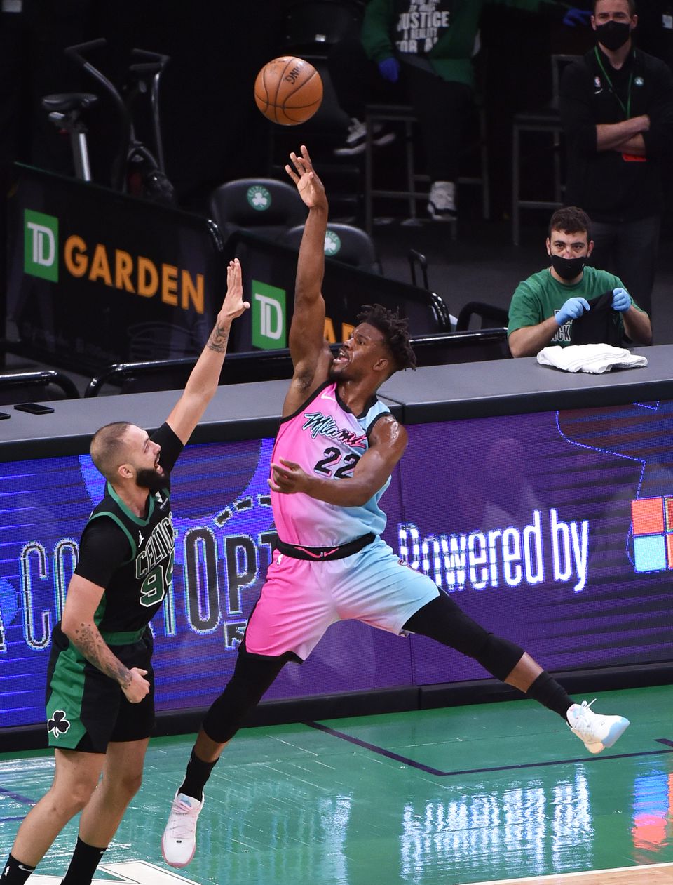 Miami Heat forward Jimmy Butler (22) shoots the ball over Boston Celtics guard Evan Fournier (94) during the second half at TD Garden in Boston, Massachusetts, May 9, 2021.Photo by Bob DeChiara-USA TODAY Sports