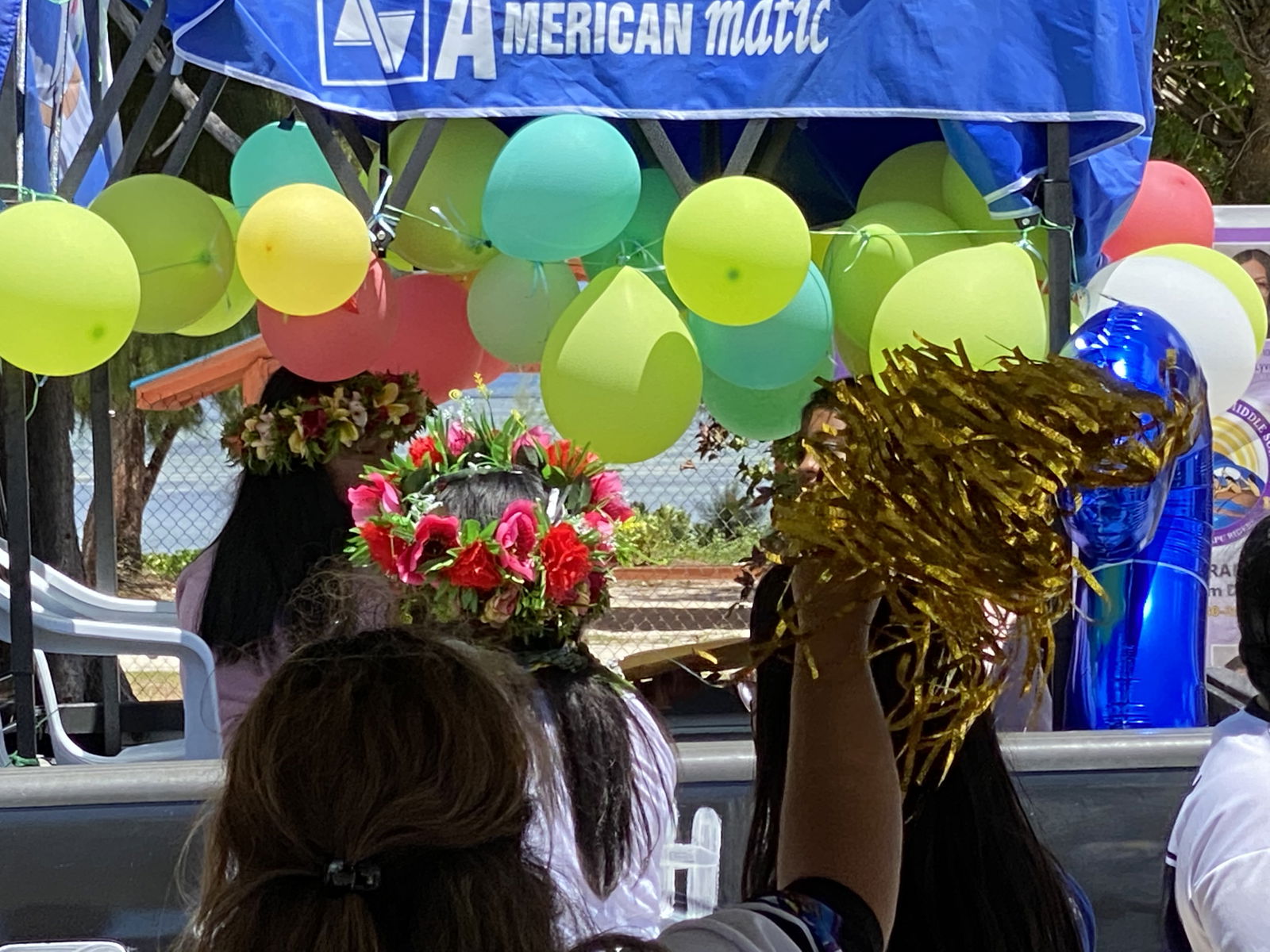 It was a festive drive-through promotion ceremony.