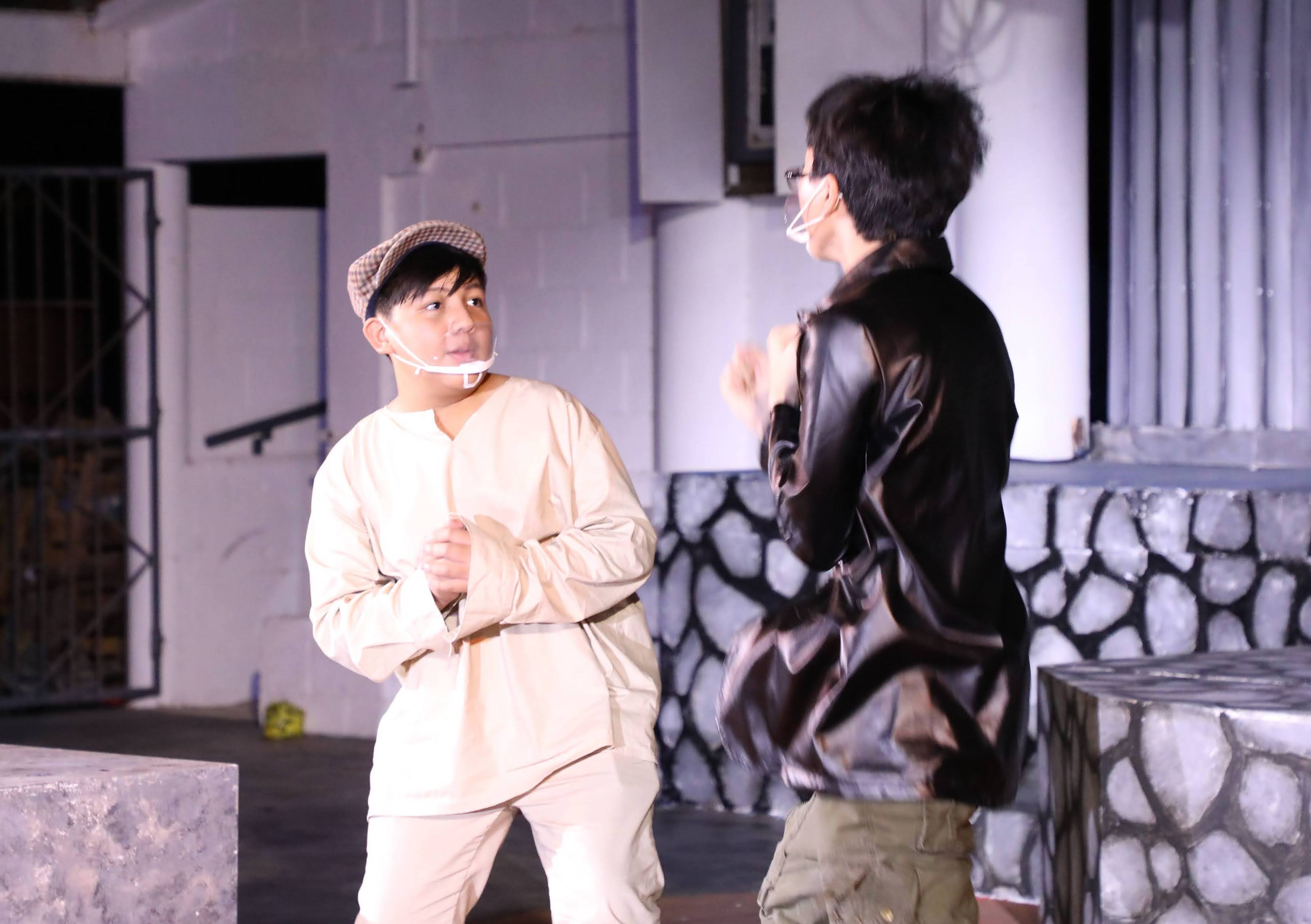 A young shepherd named William, portrayed by sixth-grade student Justin Mallari, is confronted by Touchstone, portrayed by MCS sophomore Brent Ortizo.