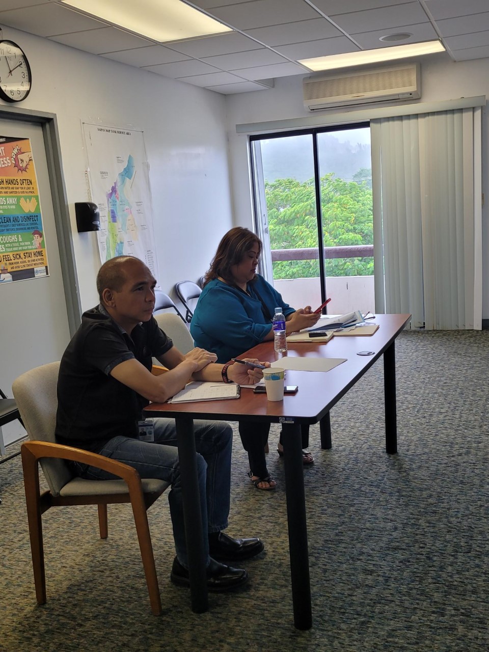 Acting Commonwealth Utilities Corp. Executive Director Betty Terlaje and chief accountant Rodolfo Urbano attend the special board meeting on Friday. CUC Executive Director Gary Camacho is on leave until June.Photo by Bryan Manabat