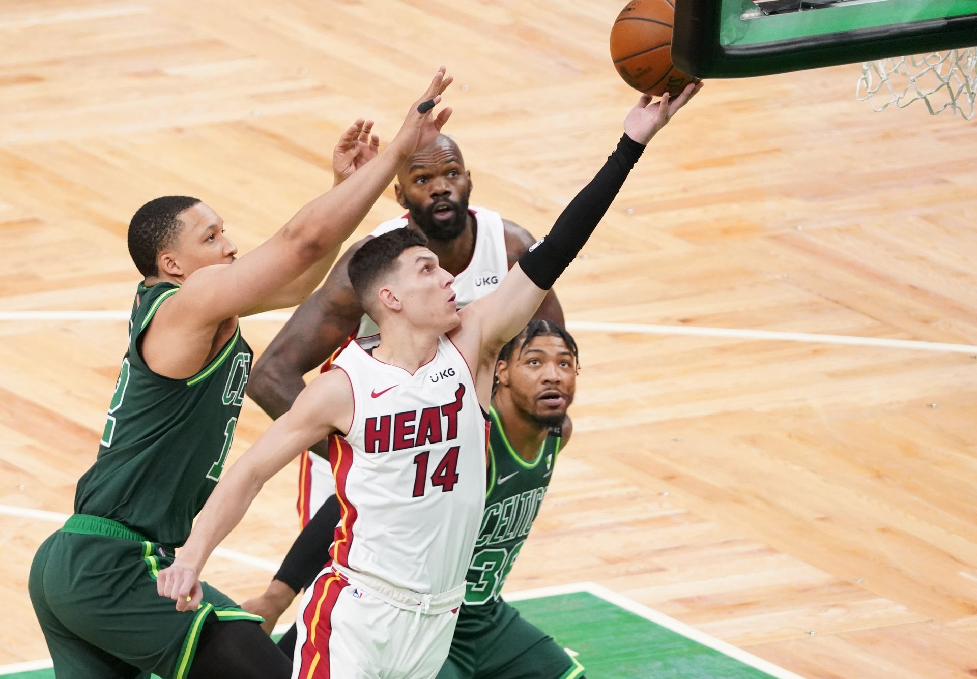 Miami Heat guard Tyler Herro (14) drives to the basket against the Boston Celtics in the first quarter at TD Garden in Boston, Massachusetts, May 11, 2021.Photo by David Butler II-USA TODAY Sports