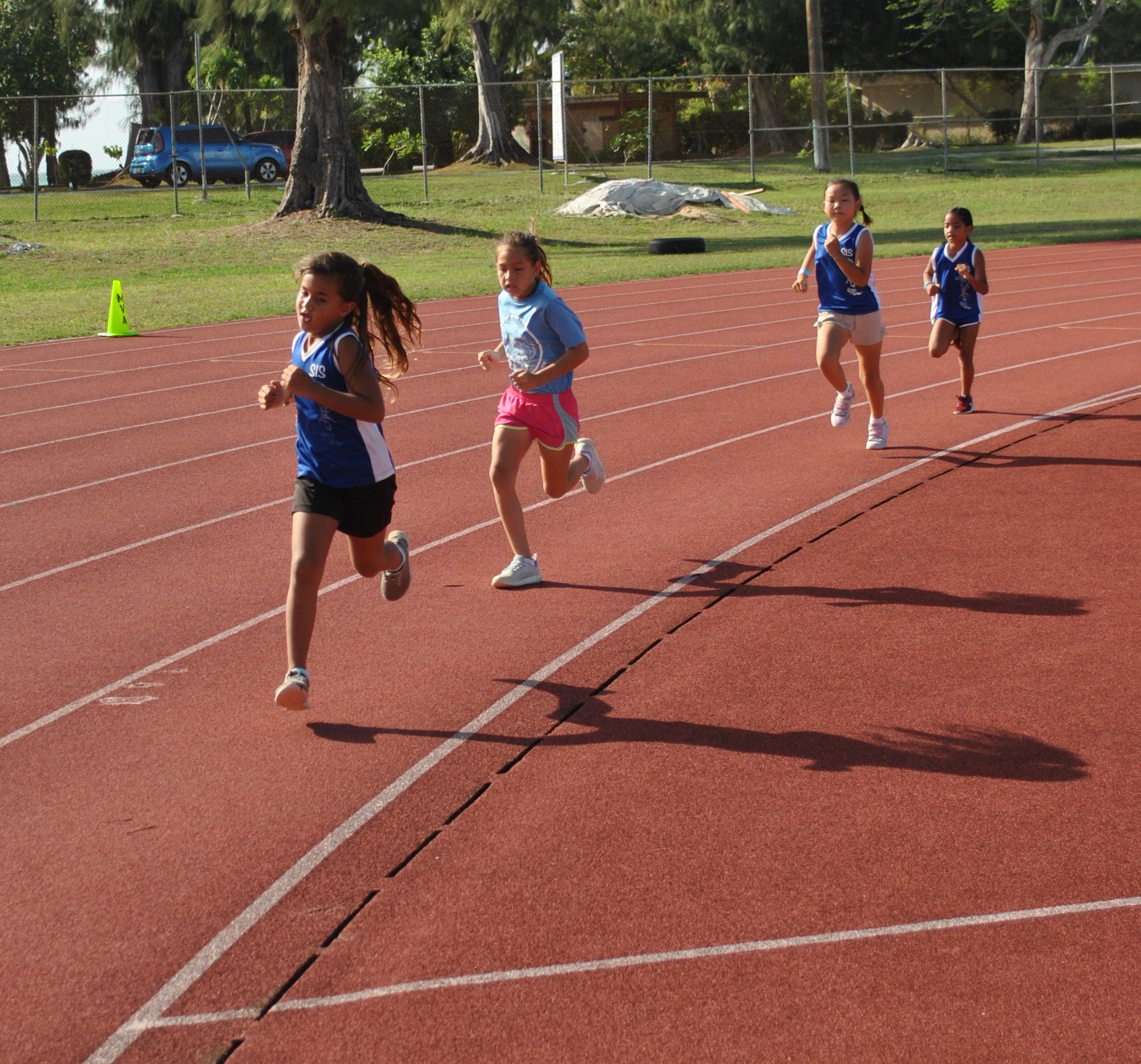 SIS' Windsor Gross leads the U9 800m run.