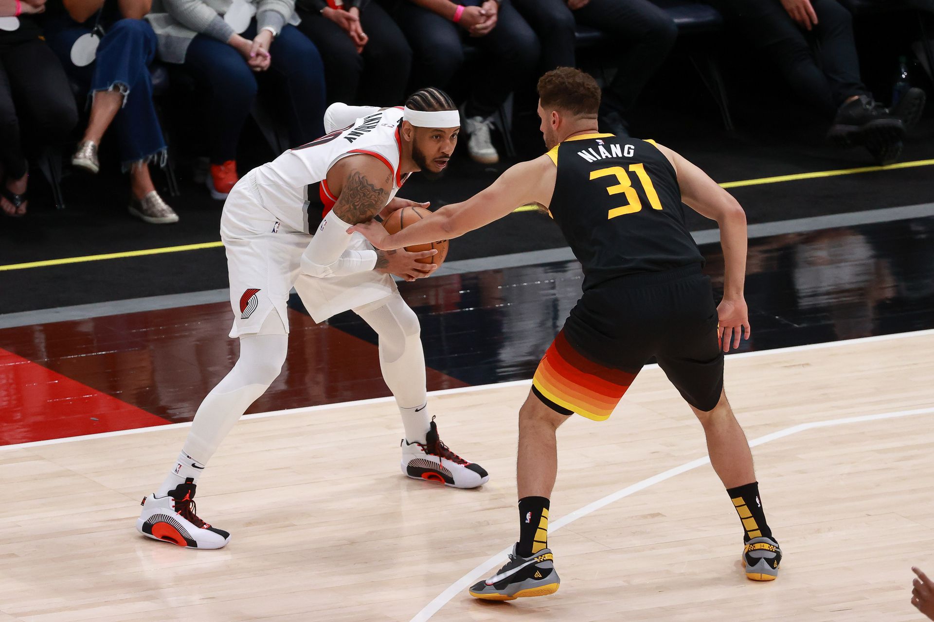 Portland Trail Blazers forward Carmelo Anthony (00) controls the ball while defended by Utah Jazz forward Georges Niang (31) during the second half at Vivint Arena in Salt Lake City, Utah on May 12, 2021 Photo by Chris Nicoll-USA TODAY Sports
