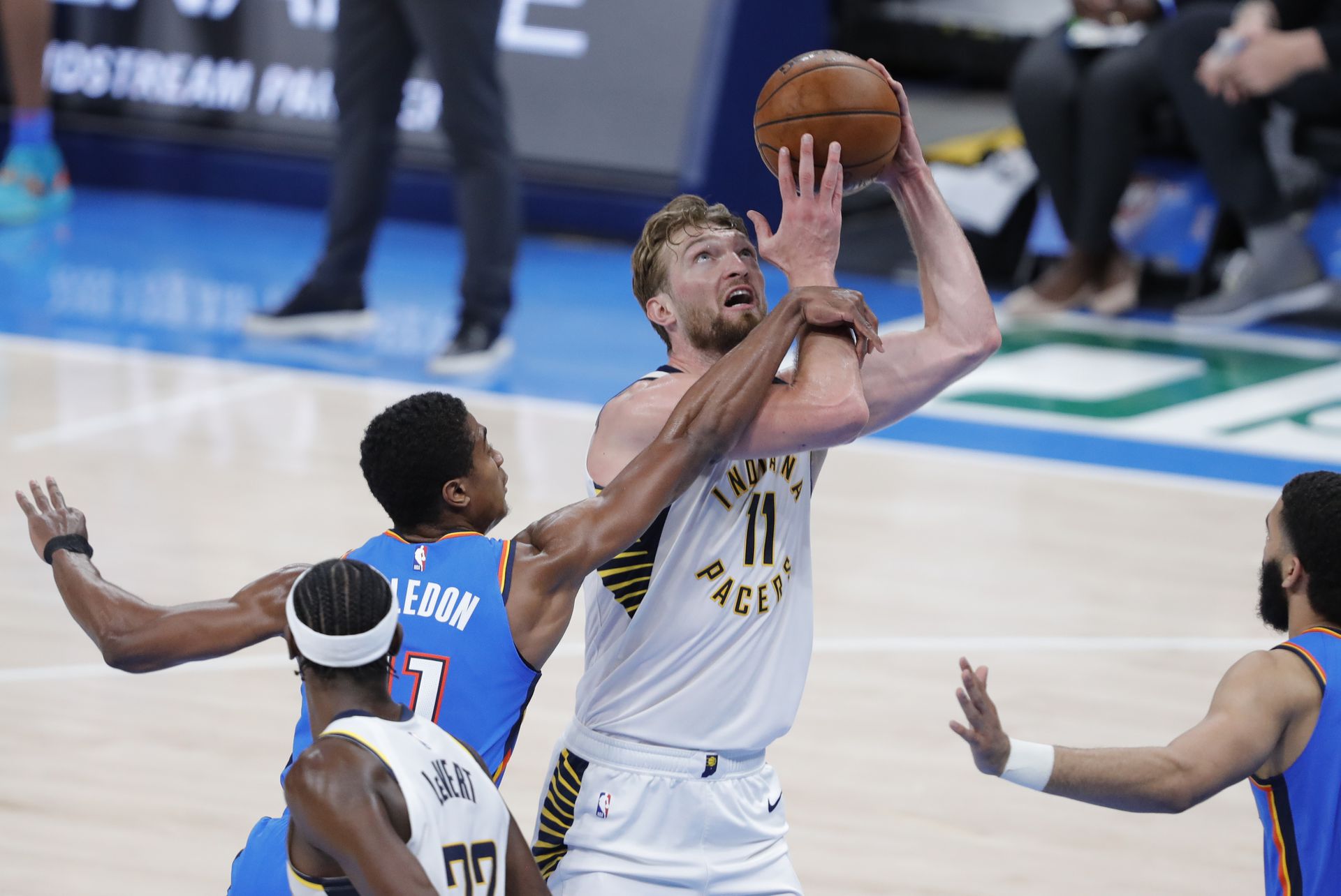 Indiana Pacers forward Domantas Sabonis (11) is fouled by Oklahoma City Thunder guard Theo Maledon (11) on the way to the basket during the third quarter at Chesapeake Energy Arena in Oklahoma City on May 1, 2021.Photo by Alonzo Adams-USA TODAY Sports