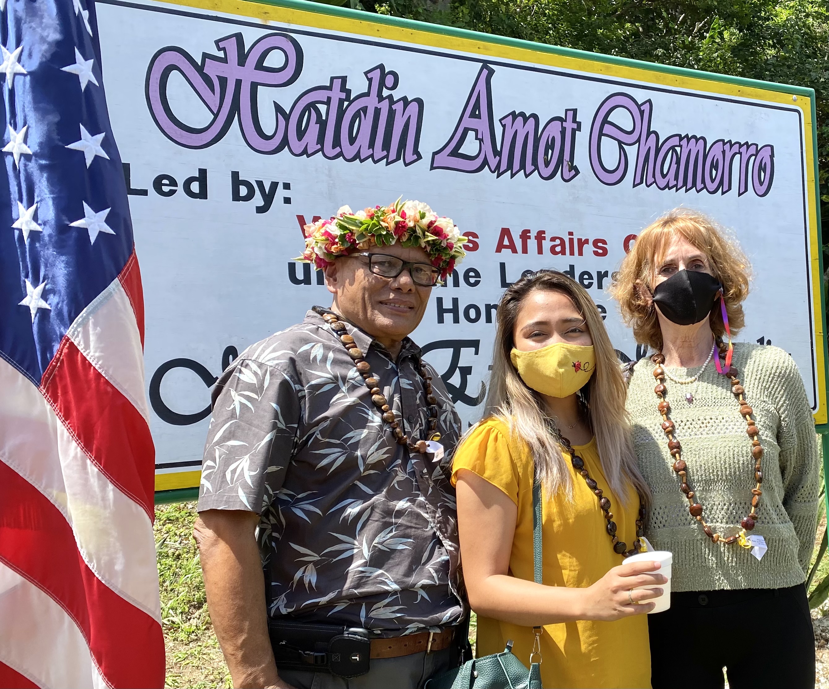 Board of Education Vice Chairman Herman Atalig and Dr. Rita H. Inos Jr. Sr. High School principal D. Tanya King with a Rota educator.