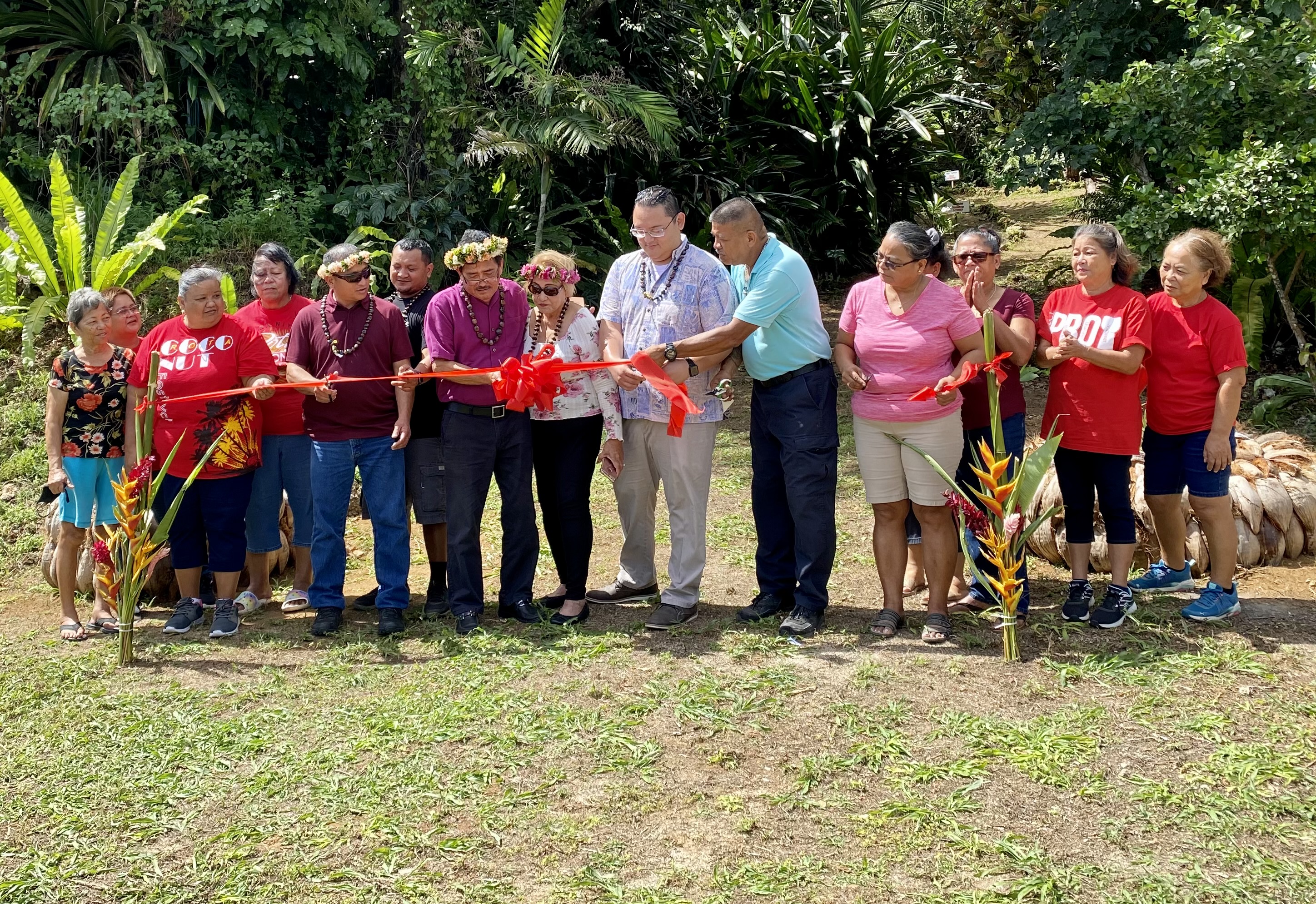 Participating in a ribbon-cutting ceremony for Hatdin Amot Chamorro, a public medicinal garden located at the foot of the Sabana mountain range in Sinapalo, are Mayor Efraim Atalig, Rep. Donald Manglona and other island leaders and community members.
