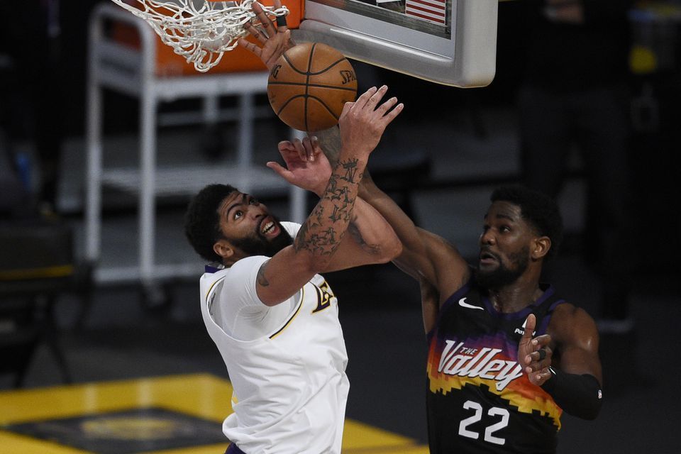 Los Angeles Lakers forward Anthony Davis (3) and Phoenix Suns center Deandre Ayton (22) battle for the rebound during the second half at Staples Center in Los Angeles, California, May 9, 2021.Photo by Kelvin Kuo-USA TODAY Sports