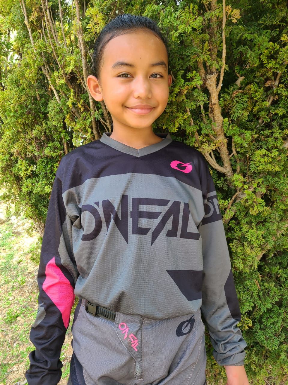 Theresa "Raptor Beast" Borja, 11, leads the Mini ATV division on her Yamaha Raptor 90cc. Her team: Naughty Natives.