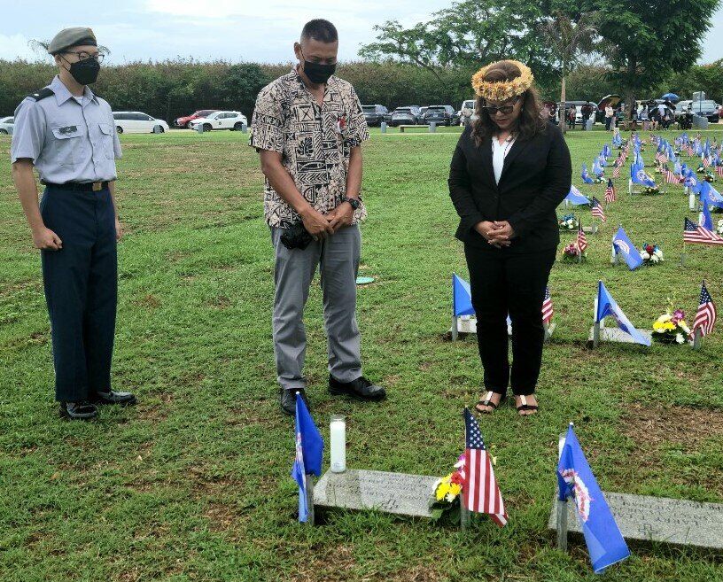 Rep. Celina Babauta and her husband, veteran Franklin Babauta, honor a loved one.