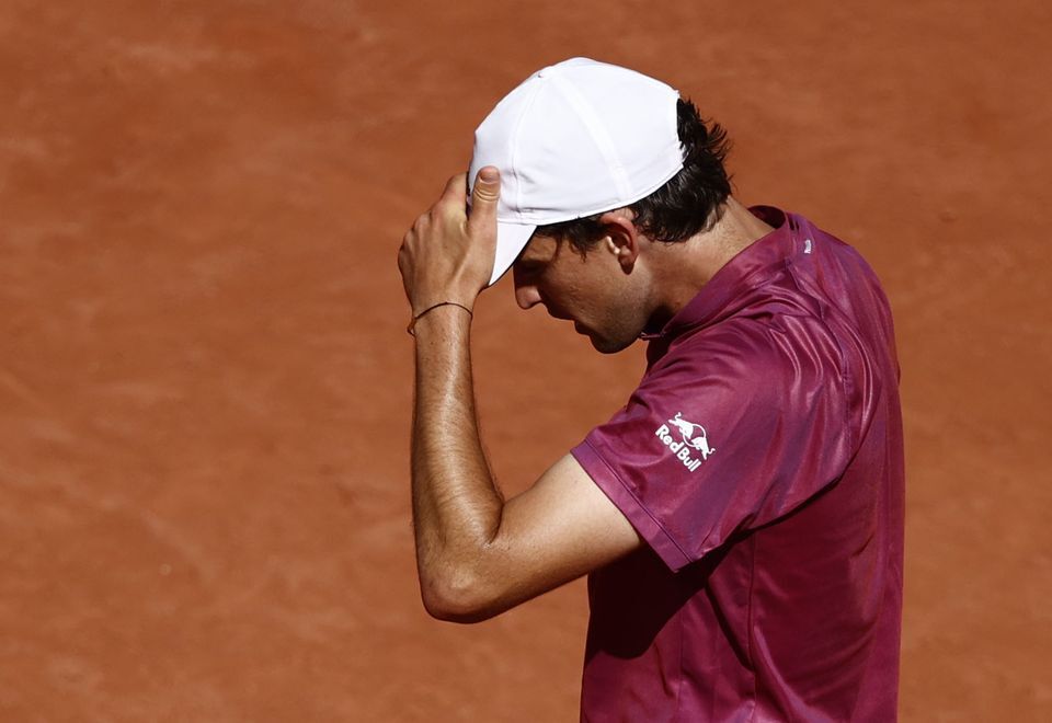 Austria's Dominic Thiem reacts during his first round match at the French Open against Spain's Pablo Andujar in Paris, May 30, 2021.REUTERS
