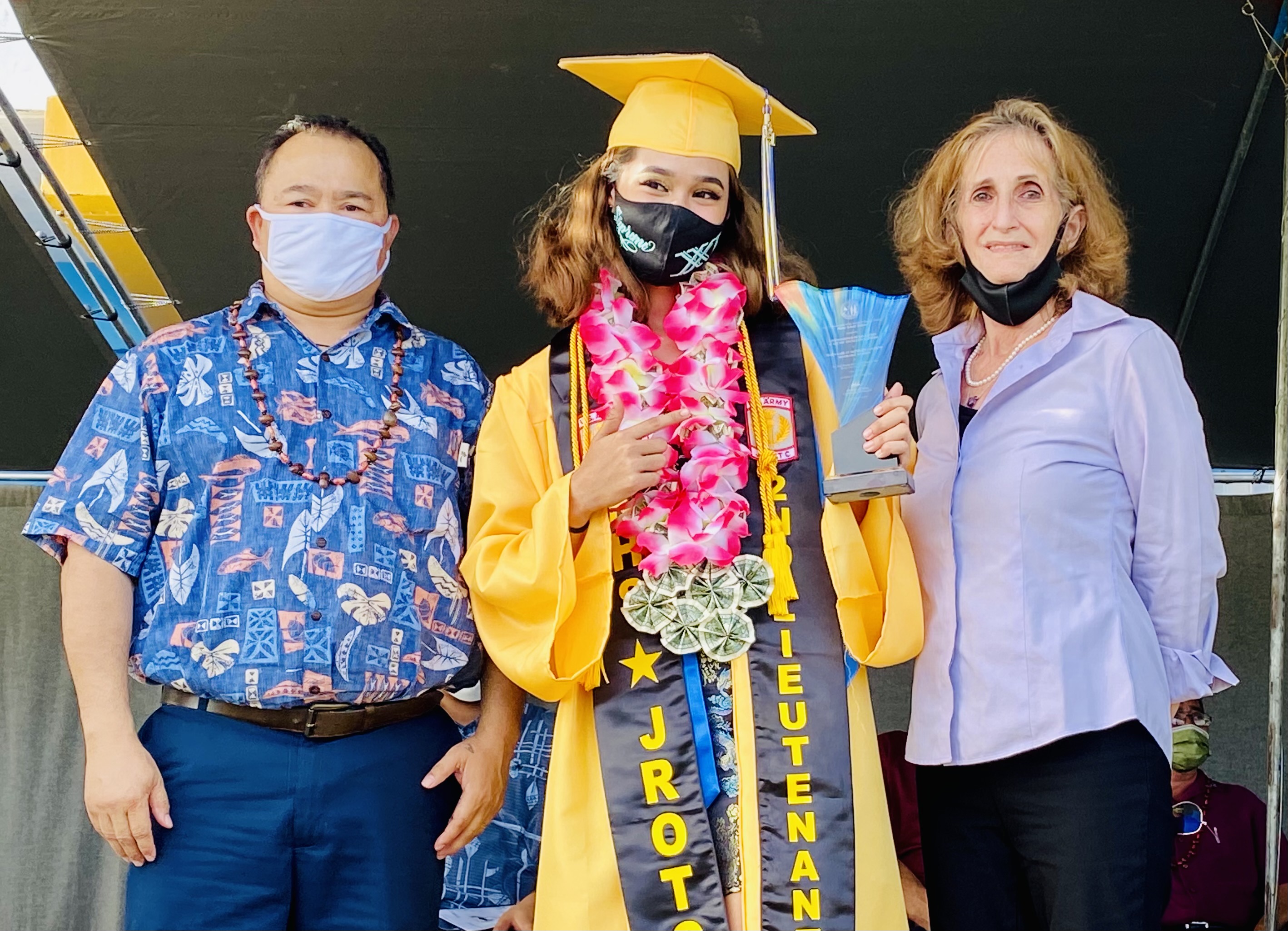 Honorable Mention Maria Karlan Agtarap Classens with  Commissioner of Education Dr. Alfred B. Ada and school principal D. Tanya King.