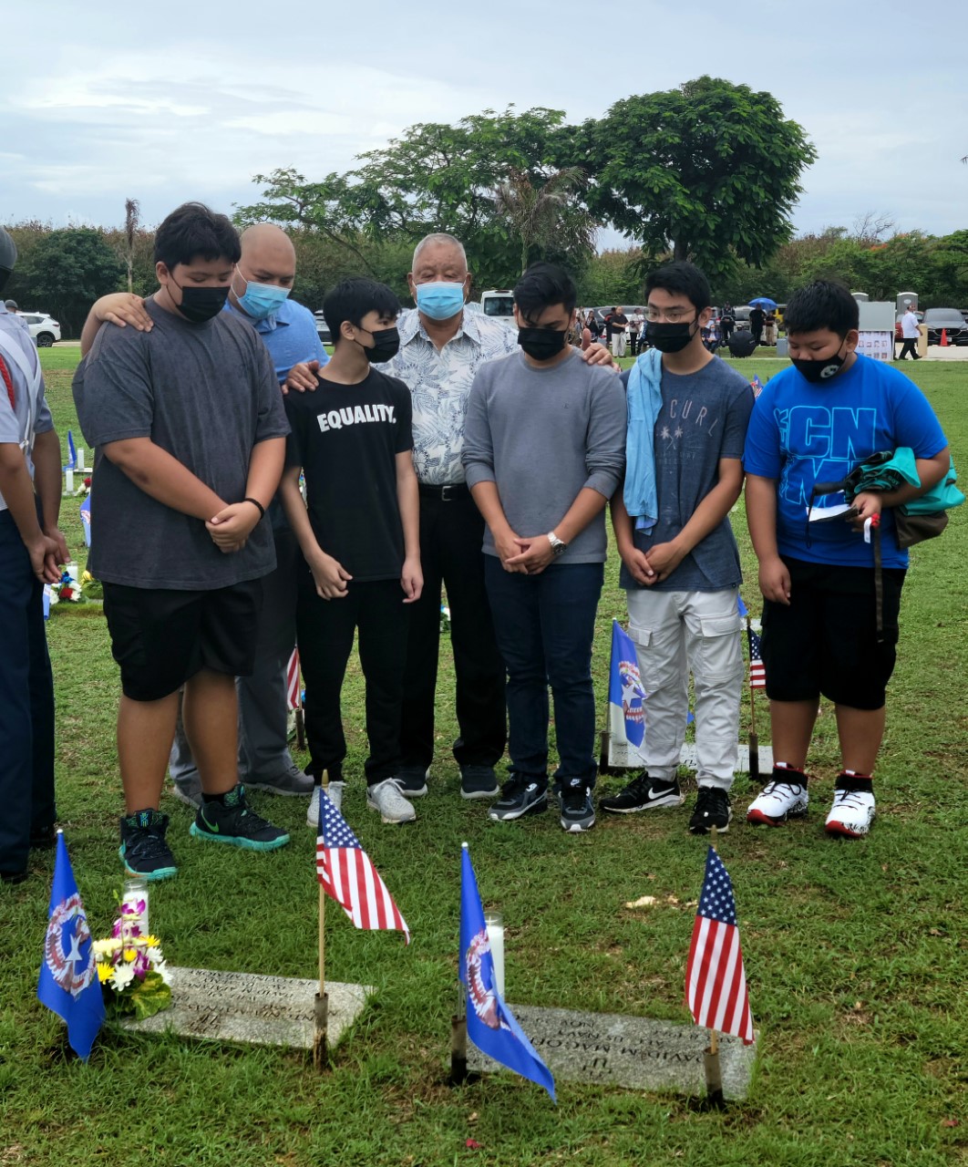 Saipan Mayor David M. Apatang, a veteran, and his loved ones pay tribute to his late wife.
