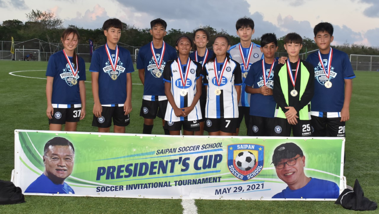 MPU 1 team members pose for a photo with their U15 championship medals.Contributed photo
