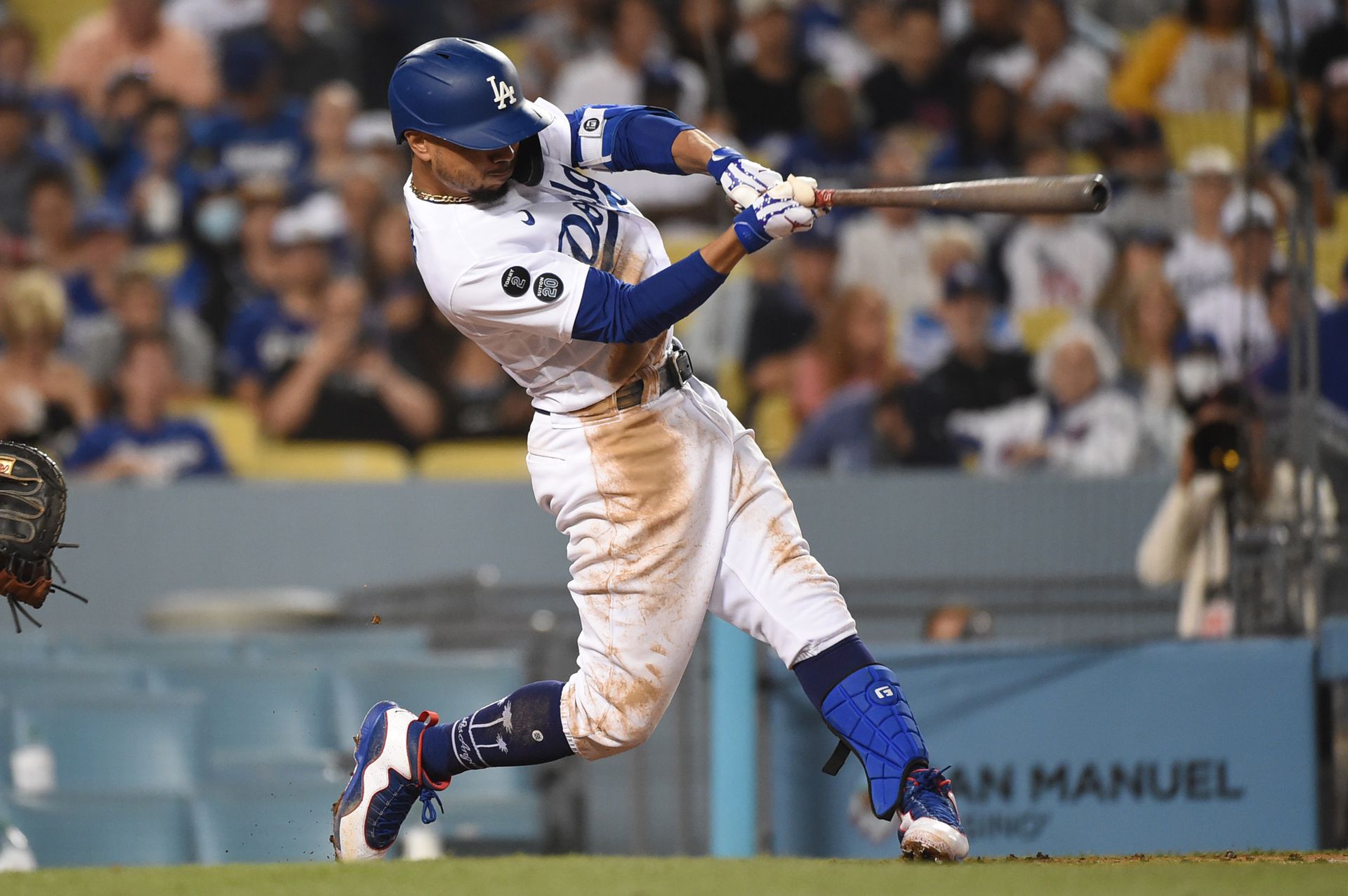 Los Angeles Dodgers right fielder Mookie Betts (50) hits a single in the fifth inning against the San Francisco Giants at Dodger Stadium in Los Angeles, California on June 28, 2021.