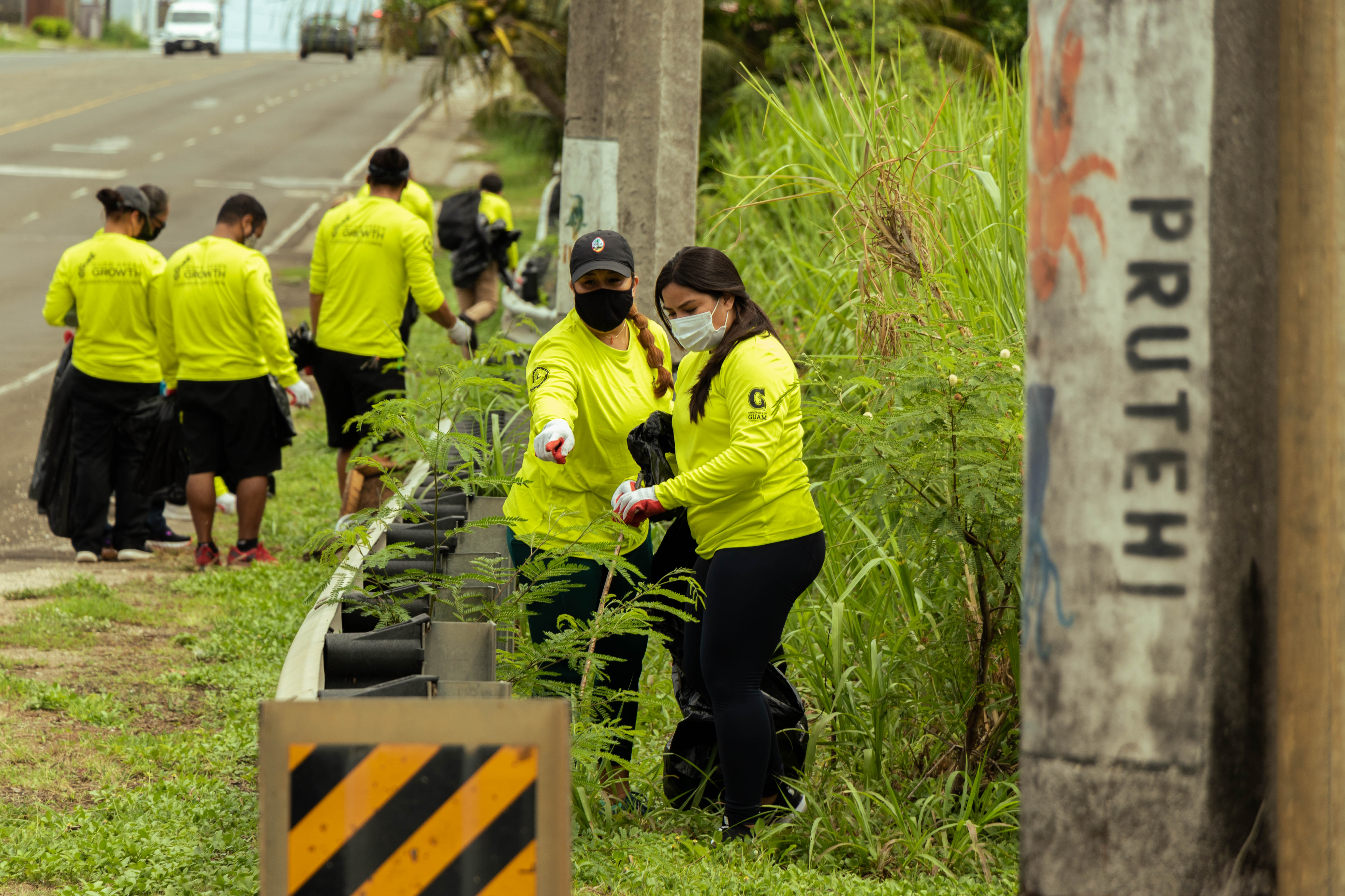 Members of the G3 Conservation Corps conduct a roadside cleanup on June 23 near the Mangilao Mayor’s Office. The corps will be participating in weekly clean-up activities for the duration of the program. 