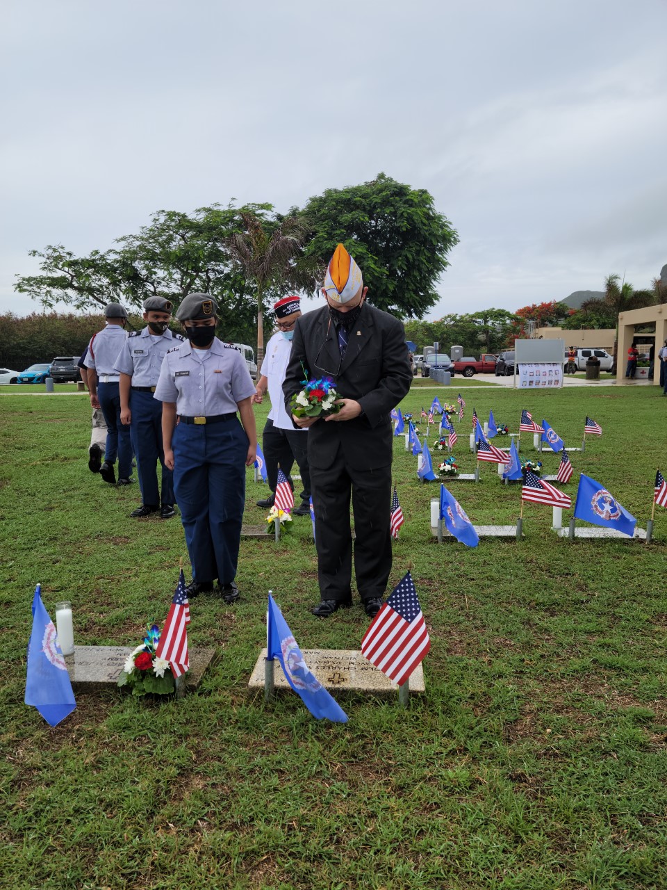 VFW Post 3457 Commander Joe W. McDoulett pays tribute to a fallen servicemember.
