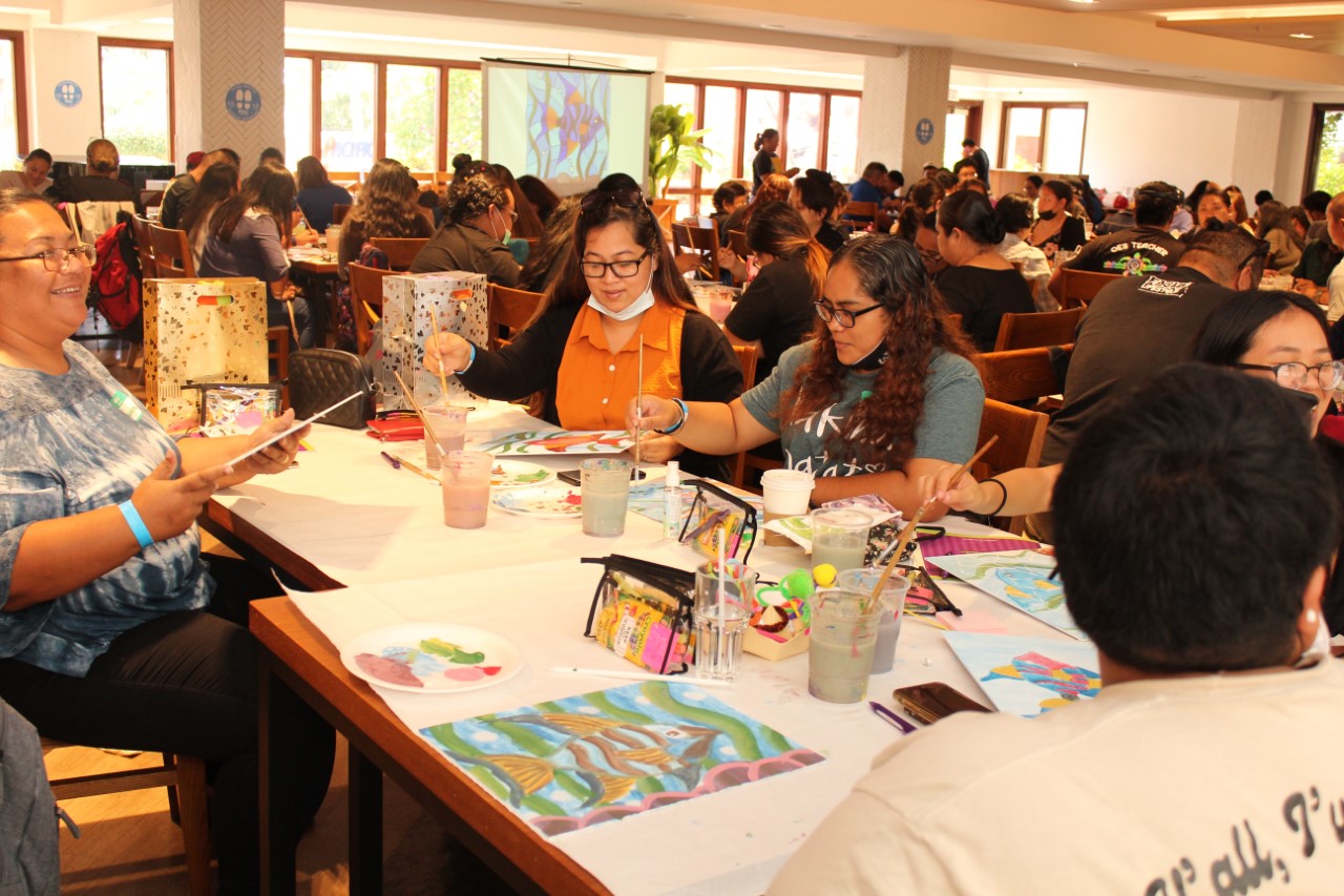 PSS personnel participate in a self-care painting activity.