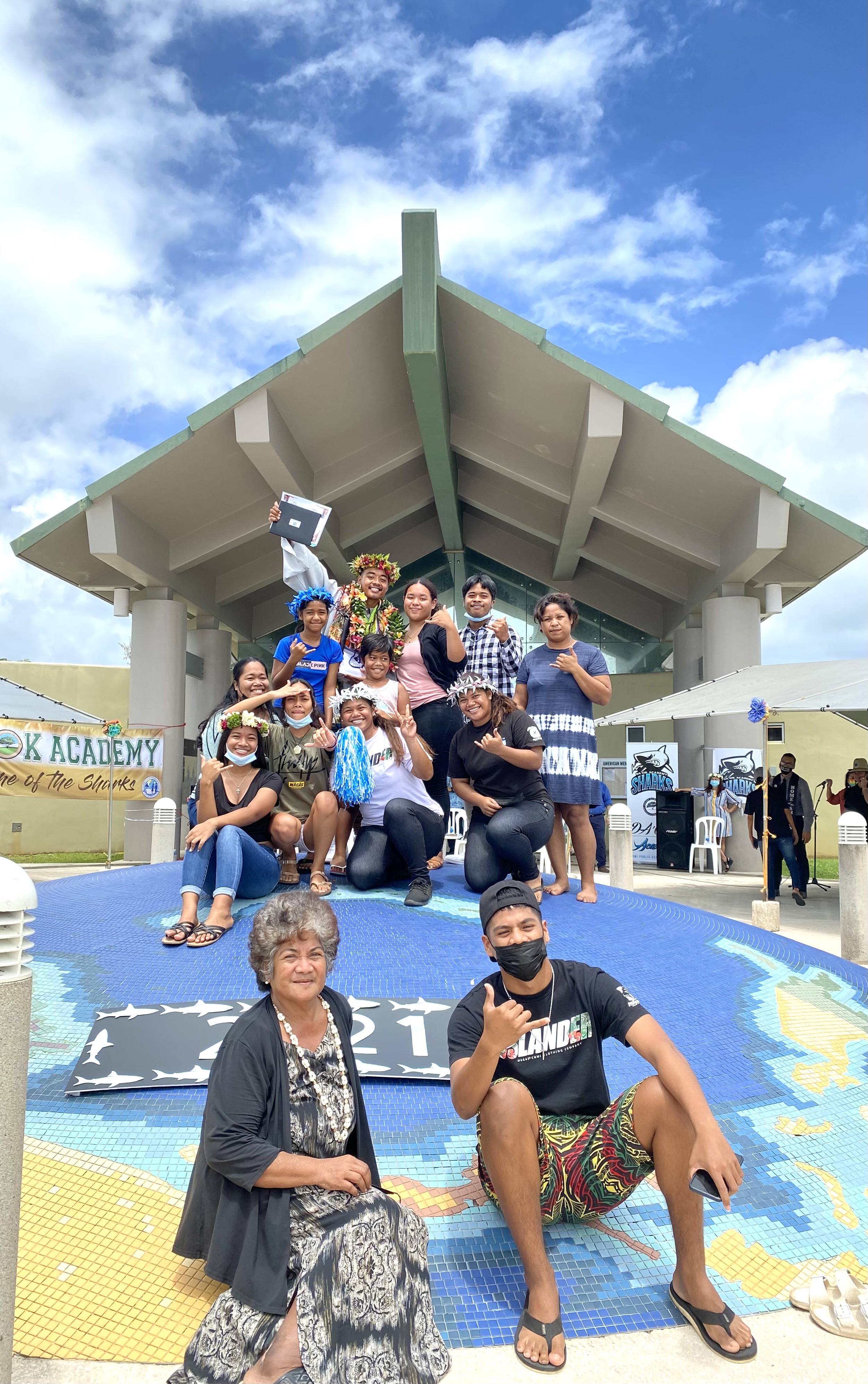 Family members celebrate a Da’ok Academy student’s graduation.