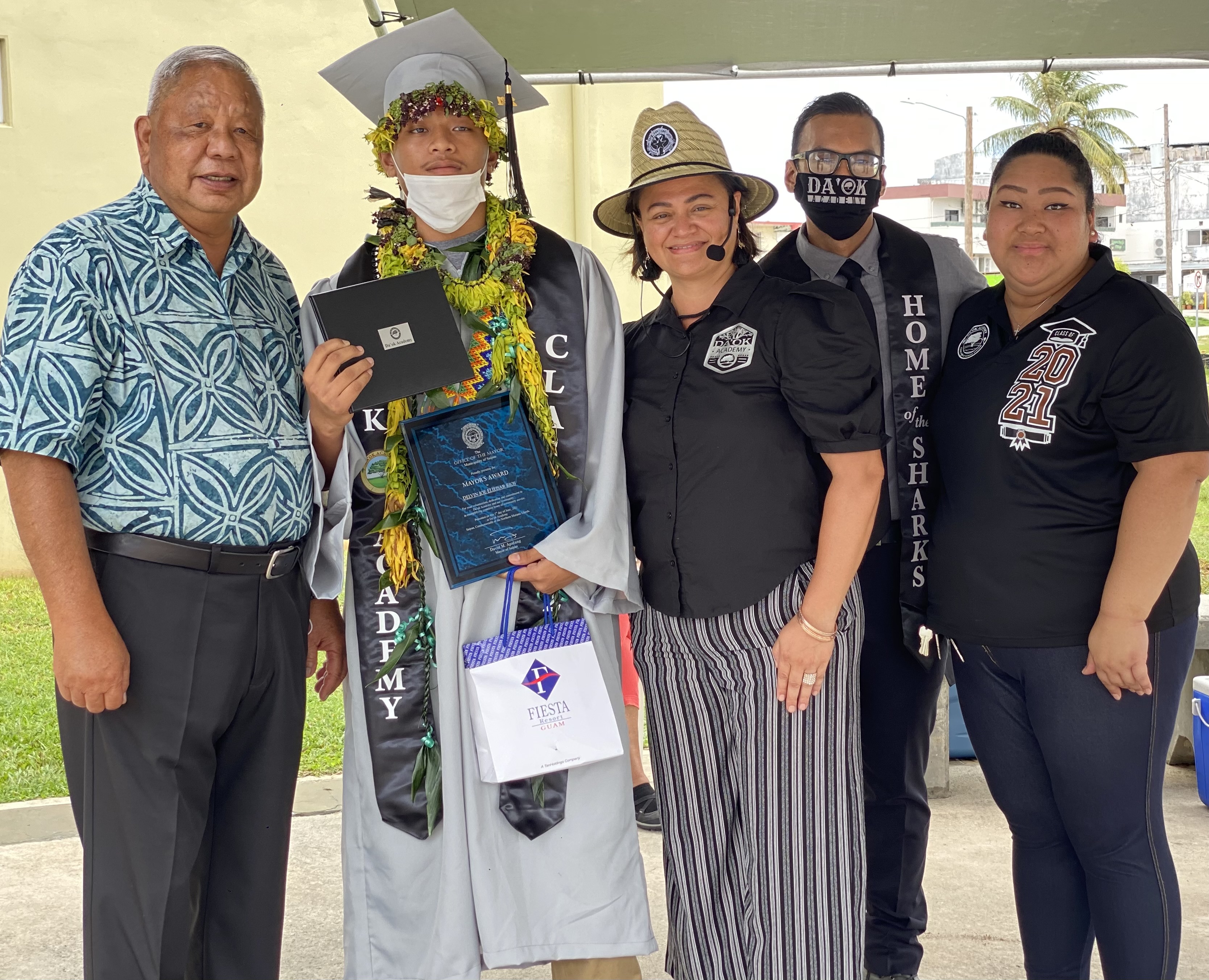 The recipient of the Mayor’s Award is Delvin Joe Elieisar Rios. Saipan Mayor David M. Apatang presented the award. Also in photo are Da’ok Academy principal Christine Tudela, Marianas High School principal Jonathan Aguon and Da’ok Academy counselor Audrey King.
