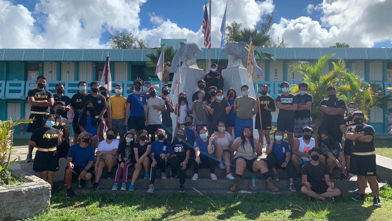 The Dolphin Battalion poses for a group picture.