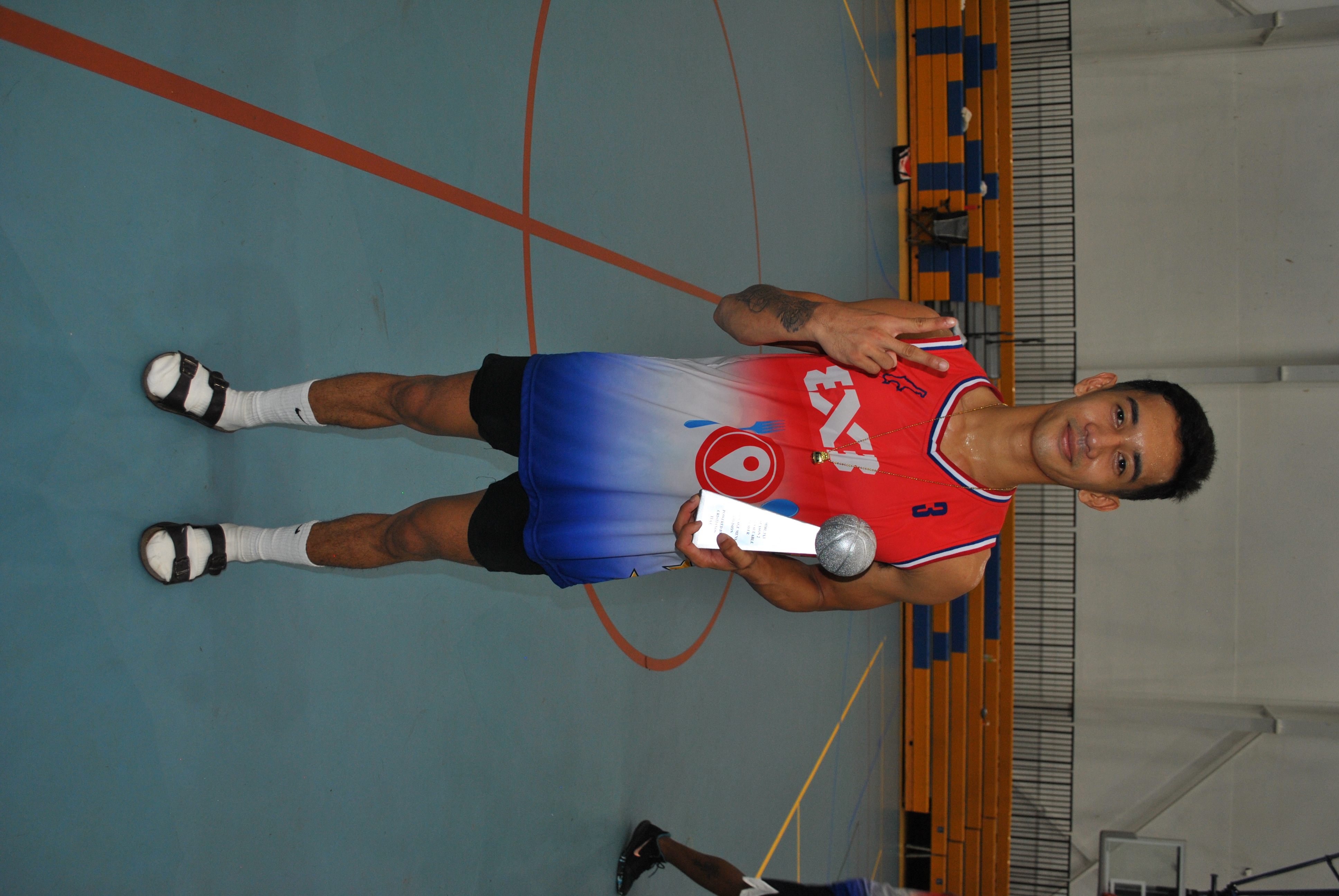 Mac Mintac poses with the MVP award.