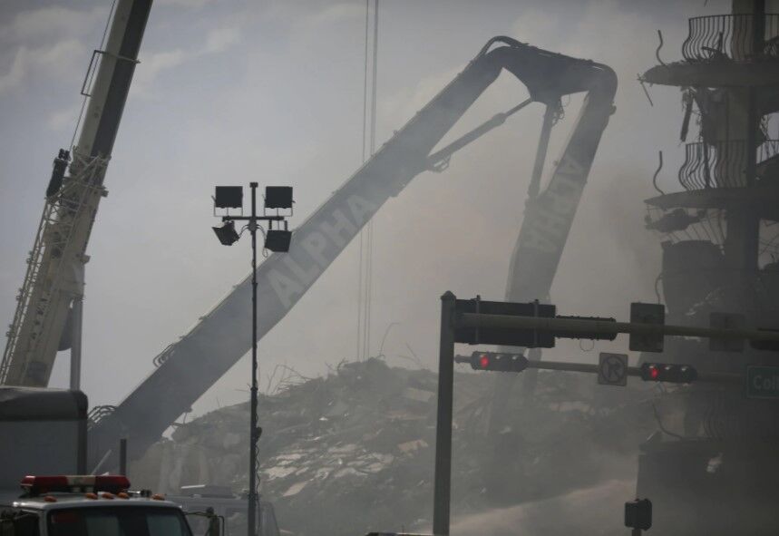 A view shows a partially collapsed residential building in Surfside, near Miami Beach, Florida, June 26, 2021. 