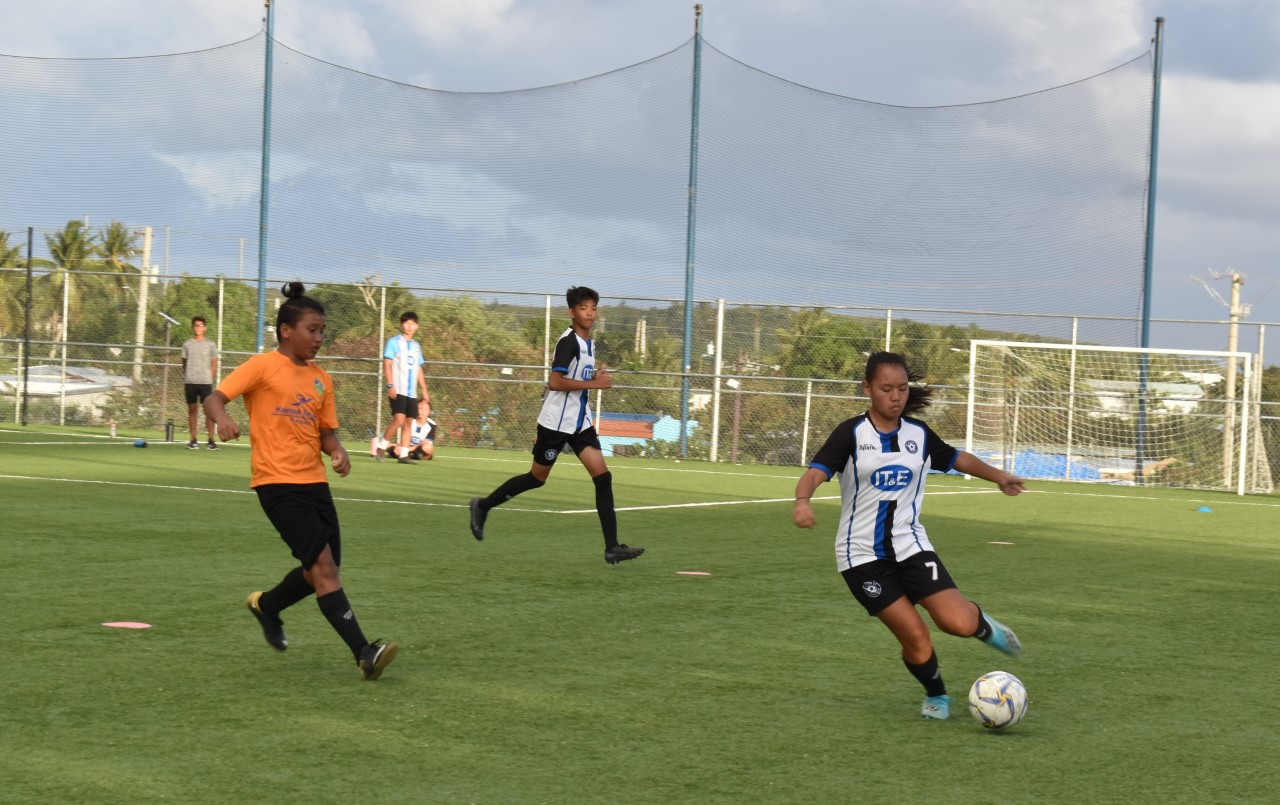 MPU 1's Aubrey Castro saves the possession during the U15 Division championship game of the 2021 President's Cup on Saturday at the NMI Soccer Training Center.Contributed photo
