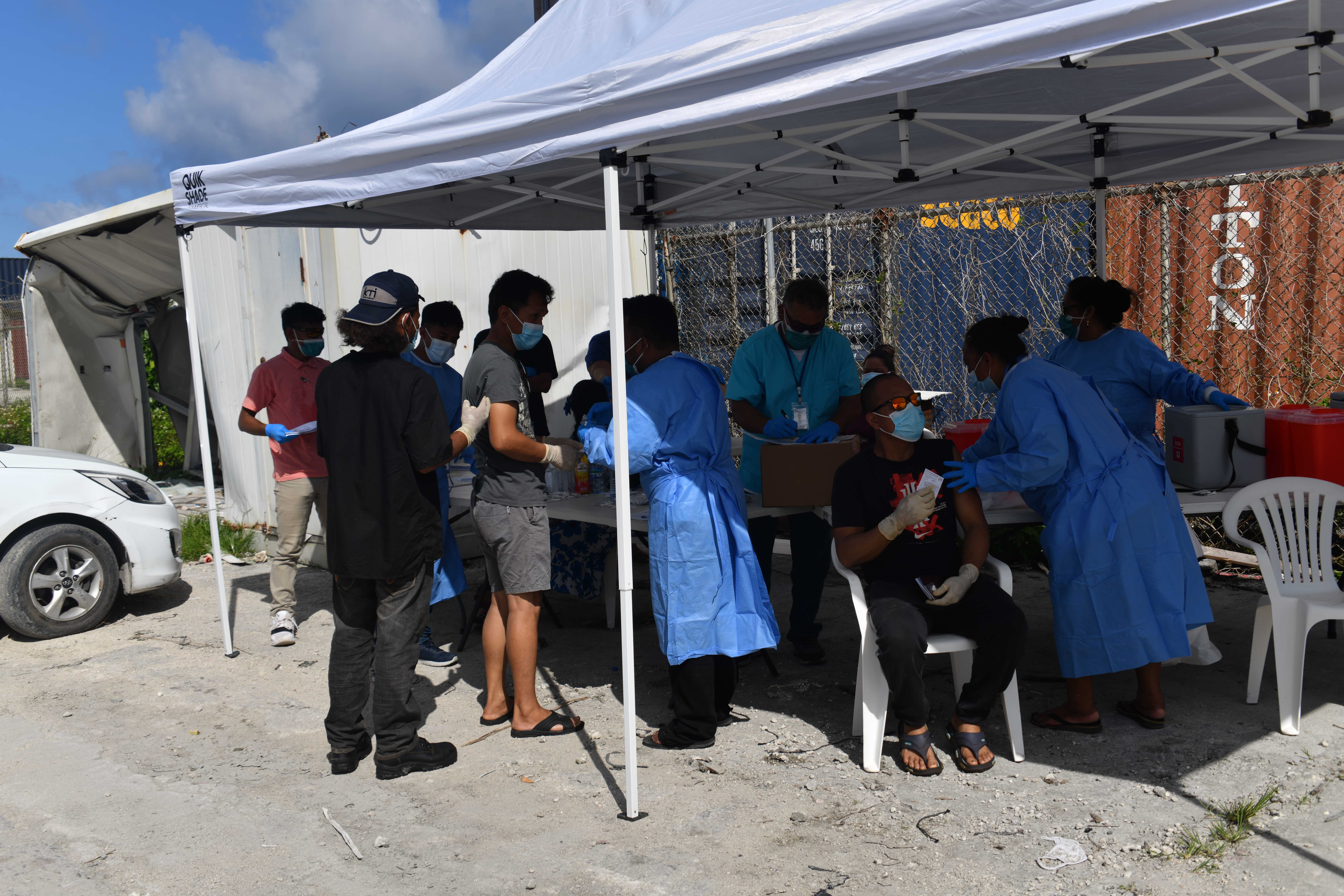 Purse seine fishermen get their Covid shots at the main commercial dock in Majuro June 9. The Marshall Islands vaccine program for fishermen is continuing for more vessels as they arrive in port Majuro to offload their catches of tuna.