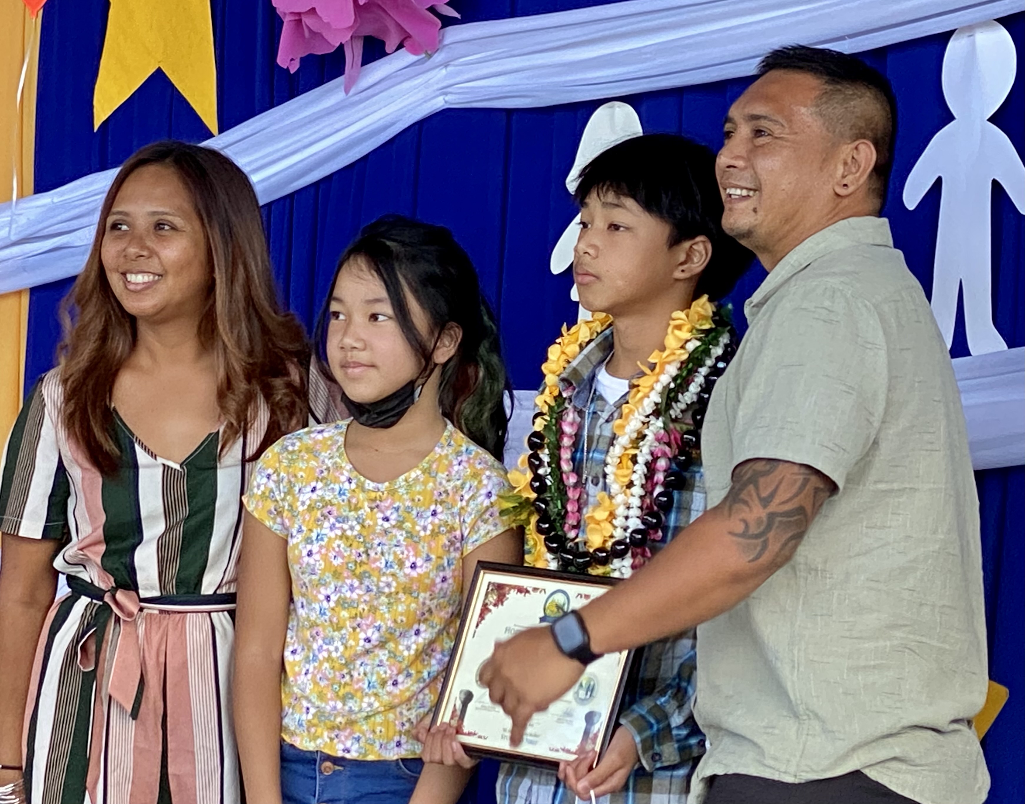 A promotee with his family.