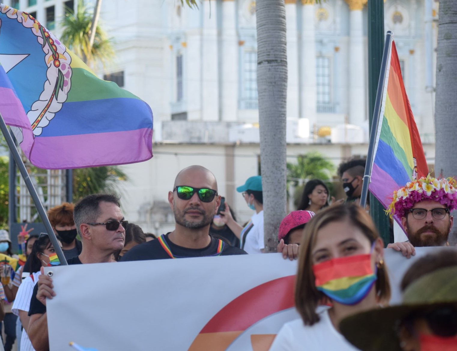 Pride Marianas member Ryan Camacho, center, joins the Stride for Pride parade.