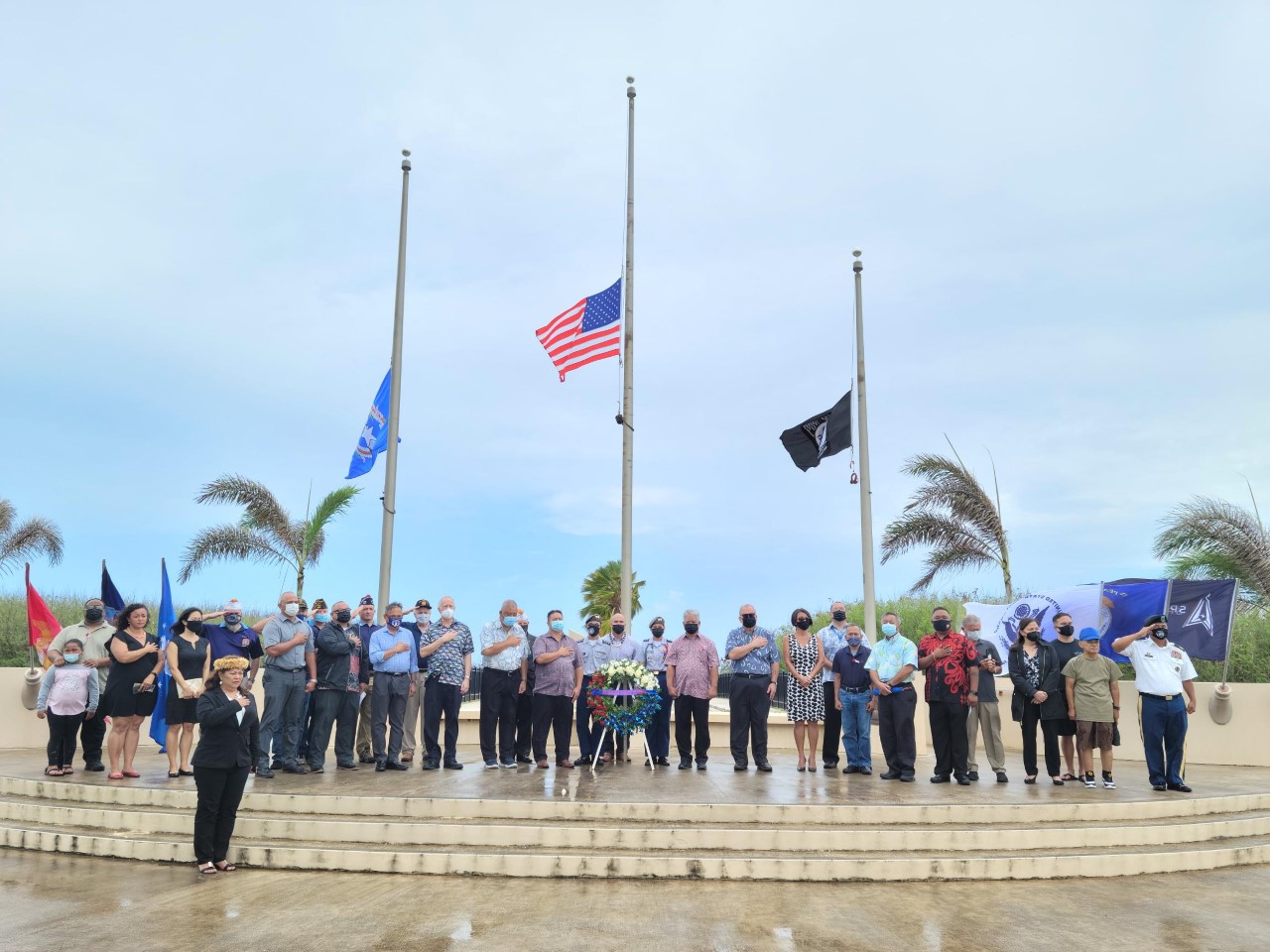Distinguished guests pay tribute to fallen servicemembers following the laying of the Memorial Day wreath.