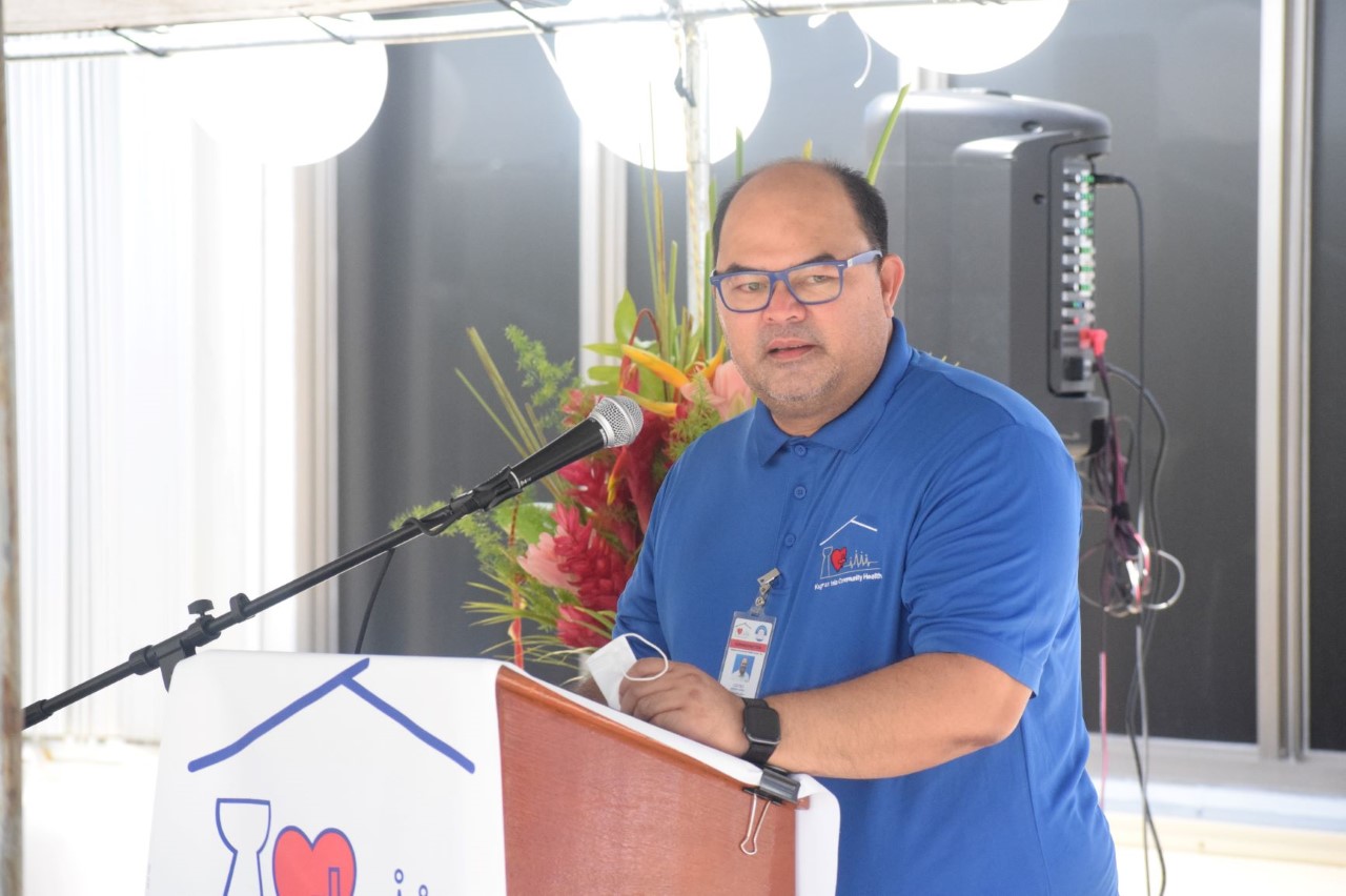 A teary eyed Kagman Isla Community Health Center Chief Executive Officer Vince Castro delivers his remarks.