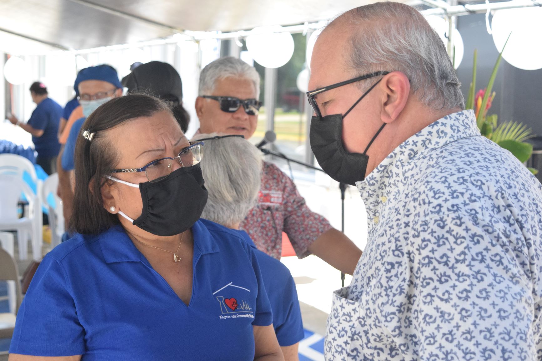 U.S. Congressman Gregorio Kilili Camacho Sablan talks with Kagman Community Health Center board member Dr. Ignacia Demapan after the ribbon-cutting ceremony.