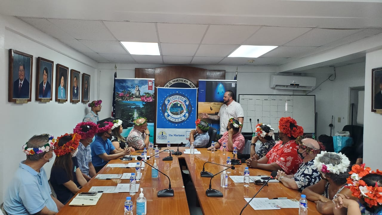 Fifteen elected and business leaders gather at the Tinian Mayor’s Office on June 11, 2021, to take the Hafa Adai & Tirow Pledge, vowing to promote the indigenous Chamorro and Carolinian culture of the islands.