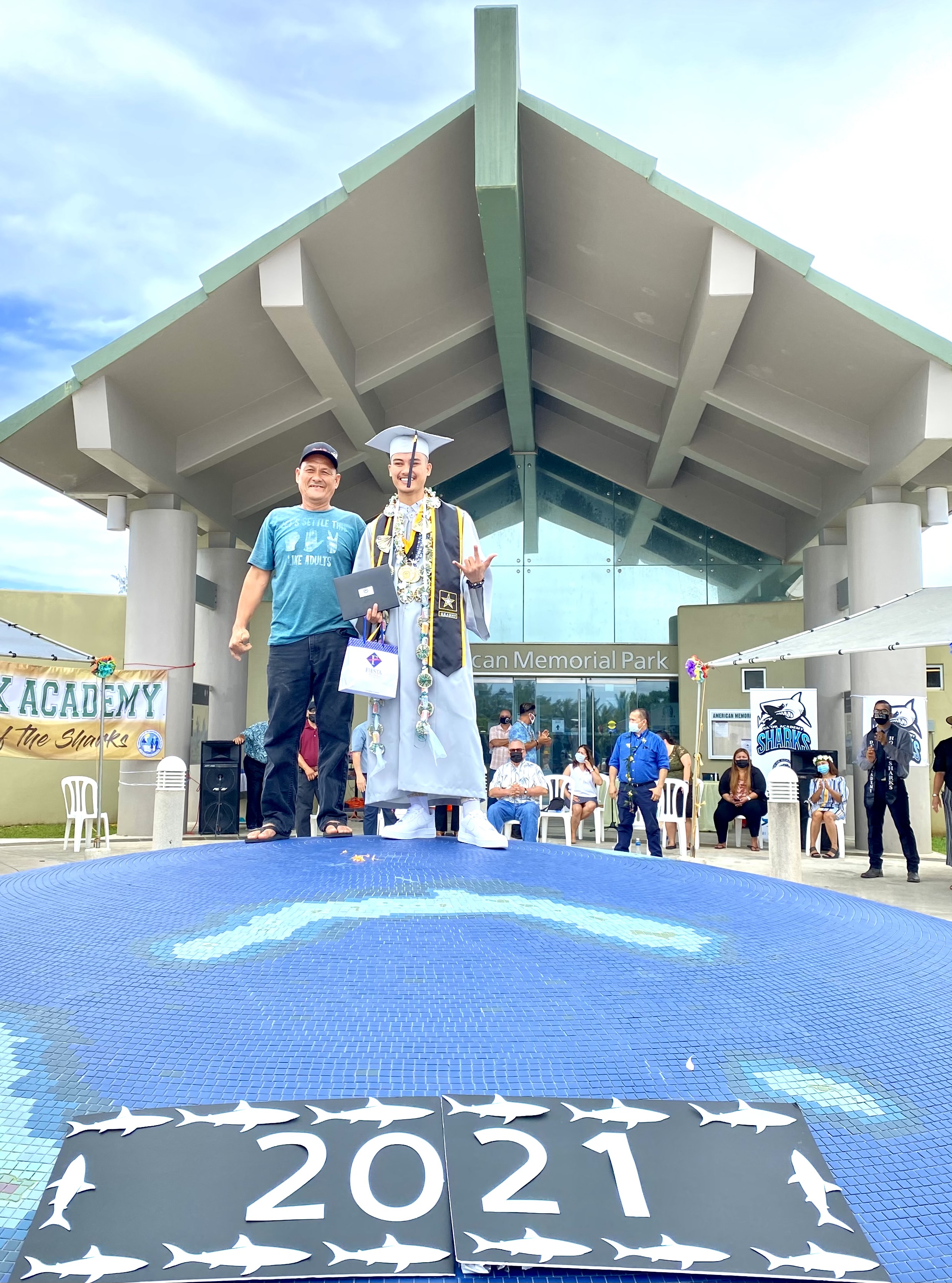 Jordan R. Encabo, recipient of the Academic Excellence in U.S. Government Award, with his father.